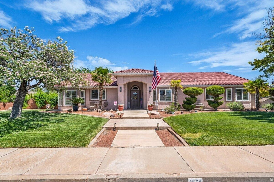 Don't miss this beautifully maintained home offering comfort, style, and thoughtful updates throughout. Ideally located just down the street from Snake Hollow Bike Park and Snow Canyon Middle and High School, it provides both convenience and access to some of the area's best recreation and schools. The exterior showcases outstanding curb appeal with mature trees and beautifully landscaped grounds that create a warm and inviting first impression. Inside, the open-concept kitchen, dining, and living areas are filled with natural light from abundant windows, complemented by tall, vaulted ceilings that enhance the spacious feel. All windows were replaced in 2025, paired with new plantation blinds, adding a fresh, modern touch throughout the home. The private backyard is a true retreat, featuring a secluded setting with a 14-foot swim spa, a gazebo complete with blinds and a fan, and gem lights along the roofline for added evening ambiance. Additional highlights include a large driveway and new WiFi-enabled garage motor equipment for everyday convenience. Buyer to verify all information, deemed reliable, however buyer to verify all info including utilities, rental restrictions, and HOA information if applicable.