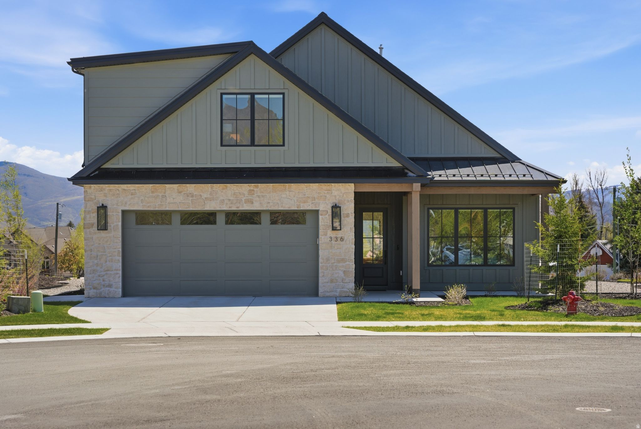 Set in the picturesque mountain town of Midway and located in the stunning community of Remund Farms, this pristine home greets you with custom millwork and natural wood beams that lend beautifully to the overall aesthetic. The open floor plan provides plenty of natural light and ease of entertaining with the dining and family rooms conveniently adjacent to the daylight chef's kitchen complete with 48" range, double ovens, quartz countertops, large eat-in island, and walk-in pantry. The owner's suite features luxurious ensuite bathroom with double vanity, enclosed commode, large shower and walk-in closet. Pass directly to the laundry room that includes side by side washer/dryer, full sink, upper cabinetry, and plenty of counter space. An additional half bath and guest bedroom/office with its own ensuite bath complete the main floor. Upstairs you will find an exceptional secondary family room that is perfect for relaxing or entertaining. Two spacious guest rooms, a double vanity bath, a flex space that can be used for storage, gym, additional office, or another bedroom are also featured on the upper level. Additional features include an epoxy coated garage with a ceiling heater and EV charging outlet. Outside you will find you are conveniently located to enjoy all that Remund Farms has to offer from the wildlife, pool, clubhouse, gym, pickleball courts, park, garden, activity barn, to the peaceful walking trails throughout. Minutes away from world renown ski resorts, golf courses, reservoirs and the tranquility of the wandering Provo River. Don't miss this opportunity to enjoy the peaceful mountain lifestyle.