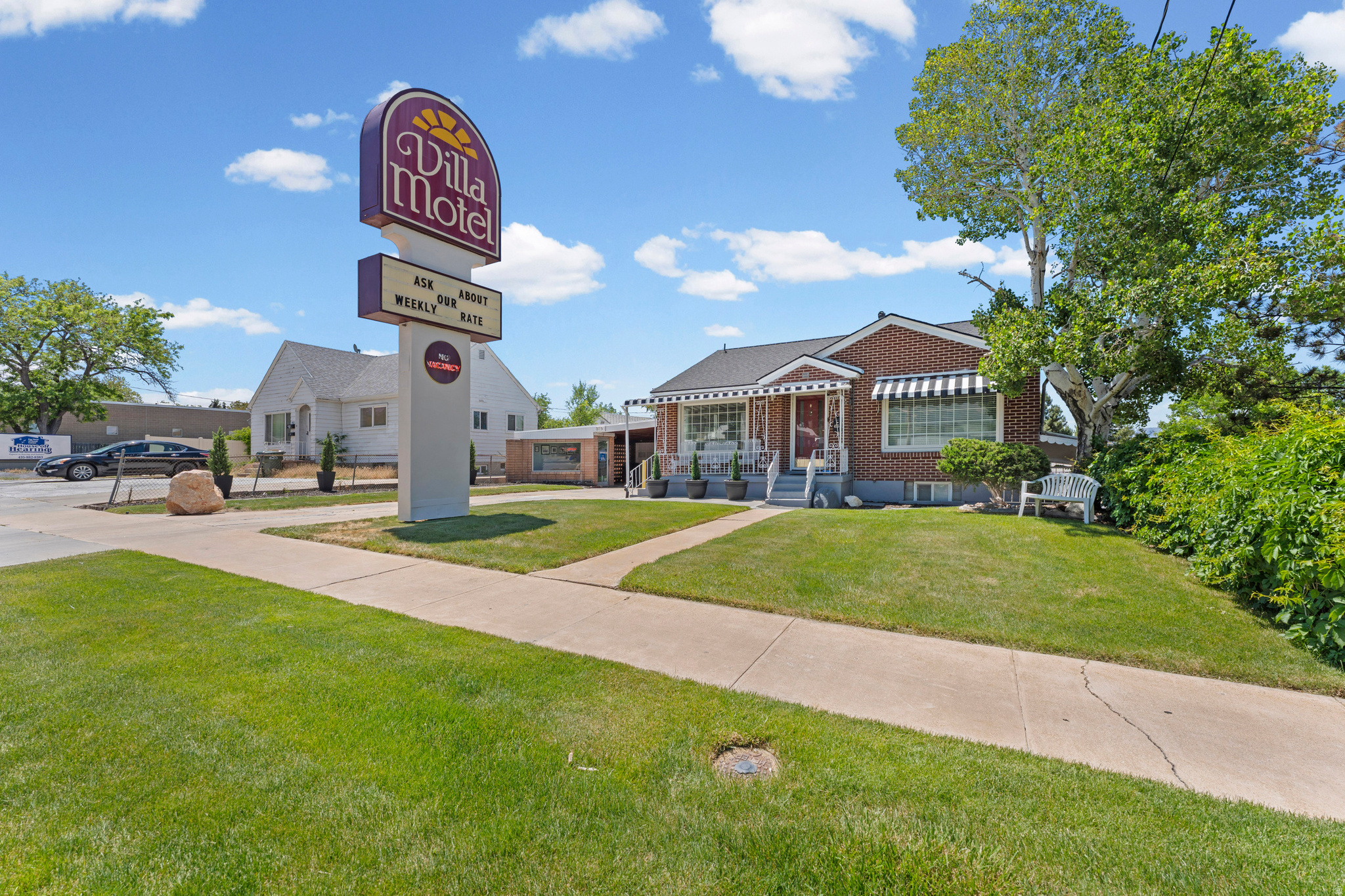 Villa Motel presents a unique investment opportunity featuring a cash-flowing 8-unit motel, a 2,040-square-foot residence, and multiple accessory improvements on a 0.51-acre General Commercial parcel. Existing improvements include approximately 1,600 square feet of motel space, a 380-square-foot garage/storage building, an 80-square-foot office, and a 370-square-foot barn, leaving substantial excess land available for future development or expansion. With dual street access from Main Street and 50 W, flexible General Commercial zoning, underutilized residential space-including a full walkout basement with kitchen-and a location within a Qualified Opportunity Zone, the property offers immediate cash flow with multiple opportunities to increase revenue through redevelopment, expansion, or additional income-producing uses.