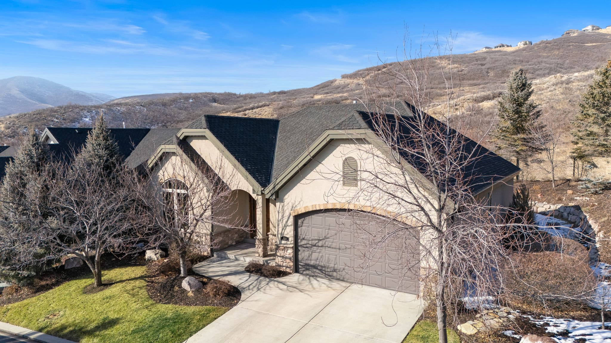 *Exceptional value opportunity*Customize the basement to your taste while remaining approximately $200,000 below the price of comparable fully finished homes in the area. Estimated total investment example:($869,900 purchase price + approx. $100,000 basement completion= $969,900). Welcome to this main floor living, one owner, spacious 3,678 total sq ft home. Designed for both comfort and functionality, This home features a bright and open floor plan with generous living spaces, large windows, and abundant natural light throughout. The kitchen provides ample cabinets and an over sized counter space, making it perfect for everyday living as well as entertaining. Multiple gathering areas offer flexibility for formal and informal use, while the spacious primary bedroom suite provides comfort, privacy and offers a relaxing retreat.. The 2nd bedroom is built into a spectacular library. The over sized 2 car garage has extra space for cabinets, bikes and storage. The unfinished basement is just waiting for your imagination. With 9-foot ceilings, there's room for 3 bedrooms (or two bedrooms and an exercise room),1 or 2 full-size bath, and a great room that could support a ceiling-mounted electric train track to mesmerize the little ones. Daylight windows offer vinca-covered rock walls.The backyard offers plenty of space for outdoor enjoyment, whether hosting gatherings, relaxing, or taking in the surrounding mountain views. Located near top-rated schools and outdoor recreation, this home combines size, location, and livability in one of Draper's most sought-after communities. This property offers convenient access to parks, hiking/biking trails, shopping, dining, and major commuter routes including I-15 and Bangerter Highway. Don't miss the opportunity to own a 3,678 sq ft home in such a prime location.Buyer to verify all information! and costs to customize the basement.
