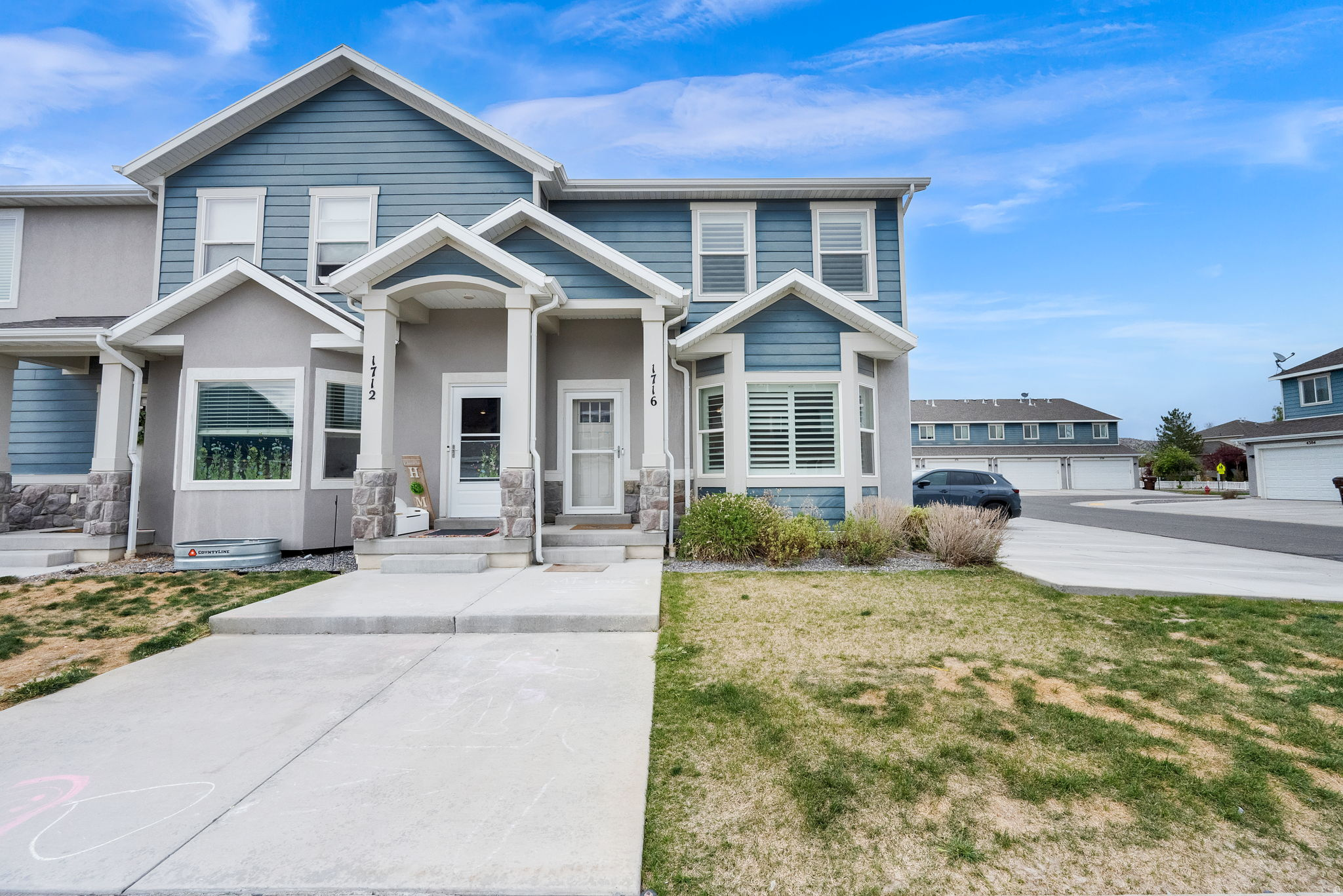 OPEN HOUSE 05/30 from 11-1. Check out the attached video walkthrough! / Welcome home to this beautiful END UNIT townhome in the heart of Eagle Mountain! Built in 2018, this stylish and inviting home features a spacious open floor plan perfect for everyday living and entertaining. The updated kitchen offers gorgeous granite countertops, reverse osmosis water filtration, and a soft water system for added comfort and convenience.  You'll love the pride of ownership throughout, including recent paint updates that give the home a fresh, modern feel. The spacious primary suite includes a private primary bathroom, creating the perfect retreat at the end of the day. Additional features include a 2-car garage and the added privacy and natural light that comes with being a desirable end unit.  Conveniently located just off Pony Express Parkway, you'll enjoy quick access to restaurants, grocery stores, parks, and everyday amenities while still enjoying the charm and community feel of Eagle Mountain. This move-in ready home has been lovingly cared for and is ready for its next owner! $1800 credit towards buyers closing costs provided by the sellers preferred lender when buyer uses sellers preferred lender. Talk to Dan Allen with Security National Mortgage for info at 435-619-4992. Buyer and buyers agent to very all information including any HOA information. Square footage figures are provided as a courtesy estimate only and were obtained from County records and previous MLS listing.  Buyer is advised to obtain an independent measurement. Photos contain VIRTUAL STAGING. FURNITURE NOT INCLUDED