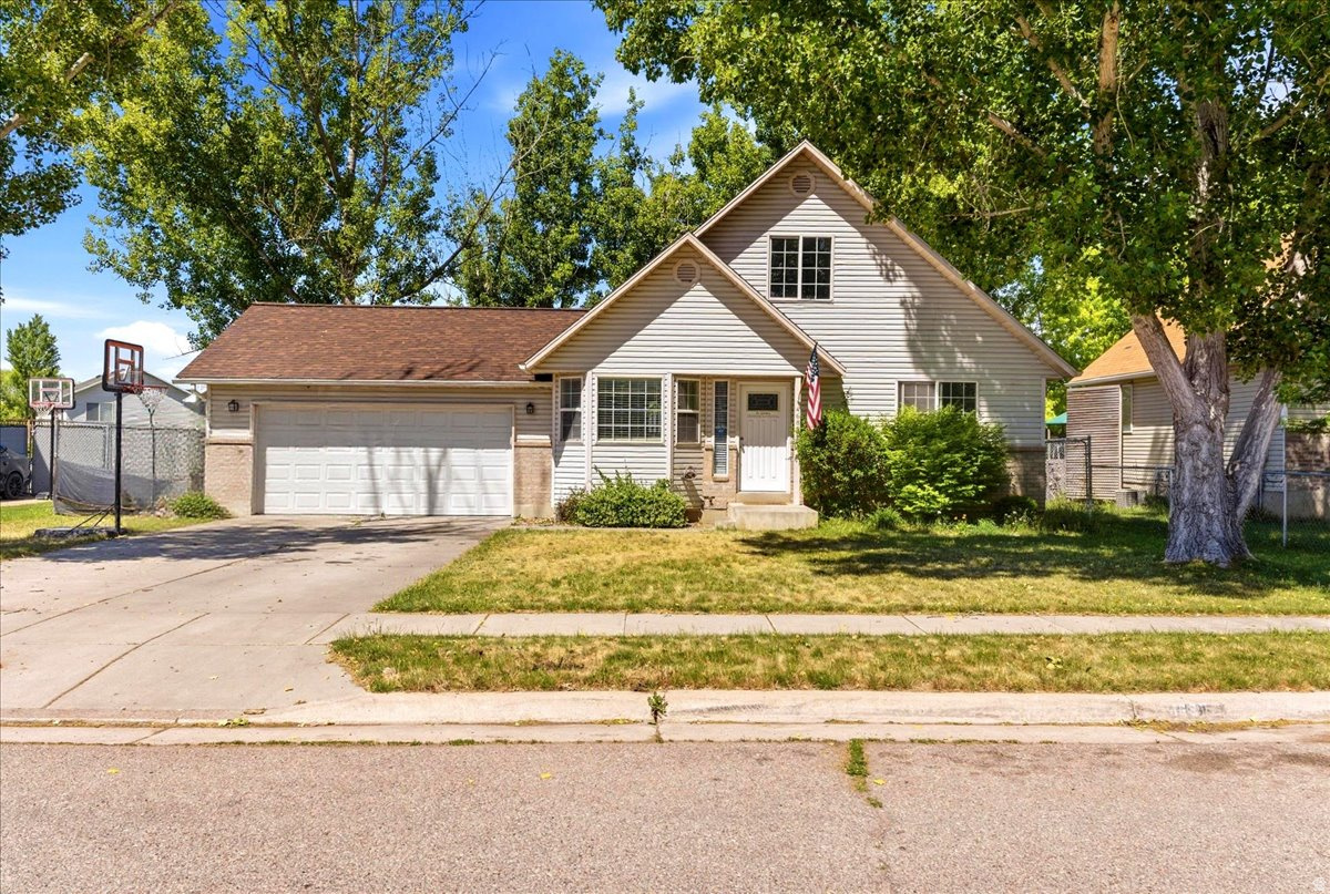 Amazing 2-story home is move-in ready! Home features LVP flooring, updated kitchen with stainless steel appliances, granite countertops, and white cabinetry, main floor master suite with walk-in closet, laundry near the master, custom railing, updated bathrooms, 2-car garage, a large fully fenced yard complete with mature trees providing shade on those hot days ahead and a park right down the street. Sq. footage per tax data records. Property facts are provided as a courtesy; Buyer to verify all information.