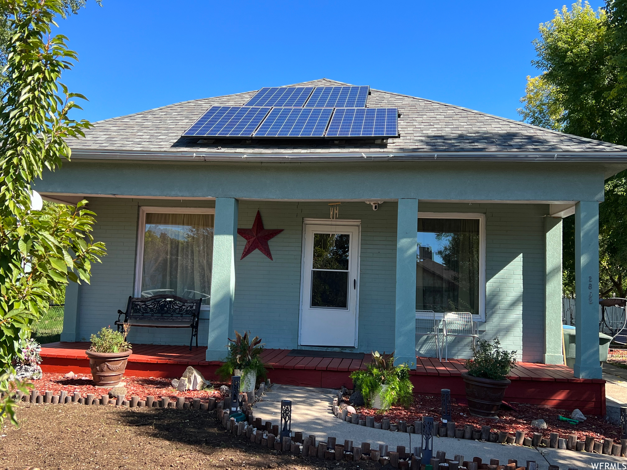 **REDUCED PRICE** Motivated Seller.  Come check out this charming three bedroom bungalow in Ogden that you can call home. Close to schools, shopping and public parks. This home sits in the heart of Ogden in a quiet street. The home features 3 bedrooms, one being a master bedroom with its own full bath. Partial basement that is mostly finished with 2 small rooms that could easily be used as an office, game room, work space or even storage. The exterior features a fully fenced yard, storage shed and a driveway that can fit between 3-5 vehicles. Covered front porch. Mature trees. Open patio in the back, perfect for family gatherings.  Home is equipped with solar panels that are included with the sale and are owned outright.  New roof and panels were installed in 2016.  Square footage figures are provided as a courtesy estimate only and were obtained from public county records.  Buyer is advised to obtain an independent measurement.