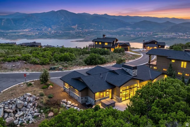 Luxury Single-Level Living In Soaring Hawk  Tucked into the coveted Soaring Hawk neighborhood and backing up to acres of protected open space, this recently built private mountain retreat with designer finishes is built for those who appreciate true craftsmanship and refined mountain living. The single-level, three bedroom, three bathroom layout offers an effortless flow, ideal for relaxed everyday living and entertaining alike.  Thoughtfully designed with high-end finishes throughout, the home flows seamlessly between the stunning indoor and outdoor spaces. Expansive sliding doors open onto a serene patio, framed by your own private mountain oasis with direct access to a network of hiking trails just steps from the door. Offered fully furnished, this is a rare opportunity to begin living the mountain lifestyle from day one. A spacious two-car garage complete with heater, EV charger, and extensive built-in storage keeps gear organized and adventure always within reach.  Positioned for both privacy and access, this home places world-class skiing, hiking, and biking, acclaimed dining, and boutique shopping right at your doorstep. Deer Valley's East Village is just minutes away, Park City's historic Old Town a short drive beyond, and Salt Lake City International Airport a convenient 45 minutes from home.