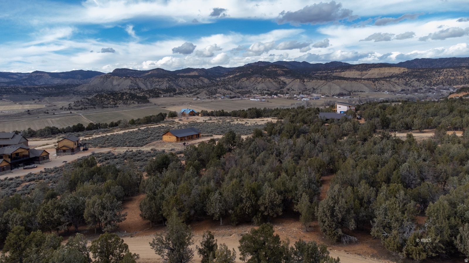 Surrounded by trees, this flat, buildable .75 acre parcel showcases stunning views of the pink coral cliffs. Seize your opportunity to own a lot in the highly sought after Quarter Circle H Ranch in Orderville, Utah. It is ideally positioned 25 minutes from Zion National Park's east entrance, and within easy reach of Bryce Canyon, Brian Head Ski Resort, the Grand Canyon, and Lake Powell, making it perfect for nature lovers. The CC&Rs support the construction of both a main and guest house, both rentable to maximize earnings. With an impressive Air DNA score of 90, the lot has potential for strong rental income. The proximity to the upcoming East Zion visitor center only adds to its appeal. This lot is a golden opportunity for investors or anyone looking to build their personal sanctuary. Buyer to verify all.