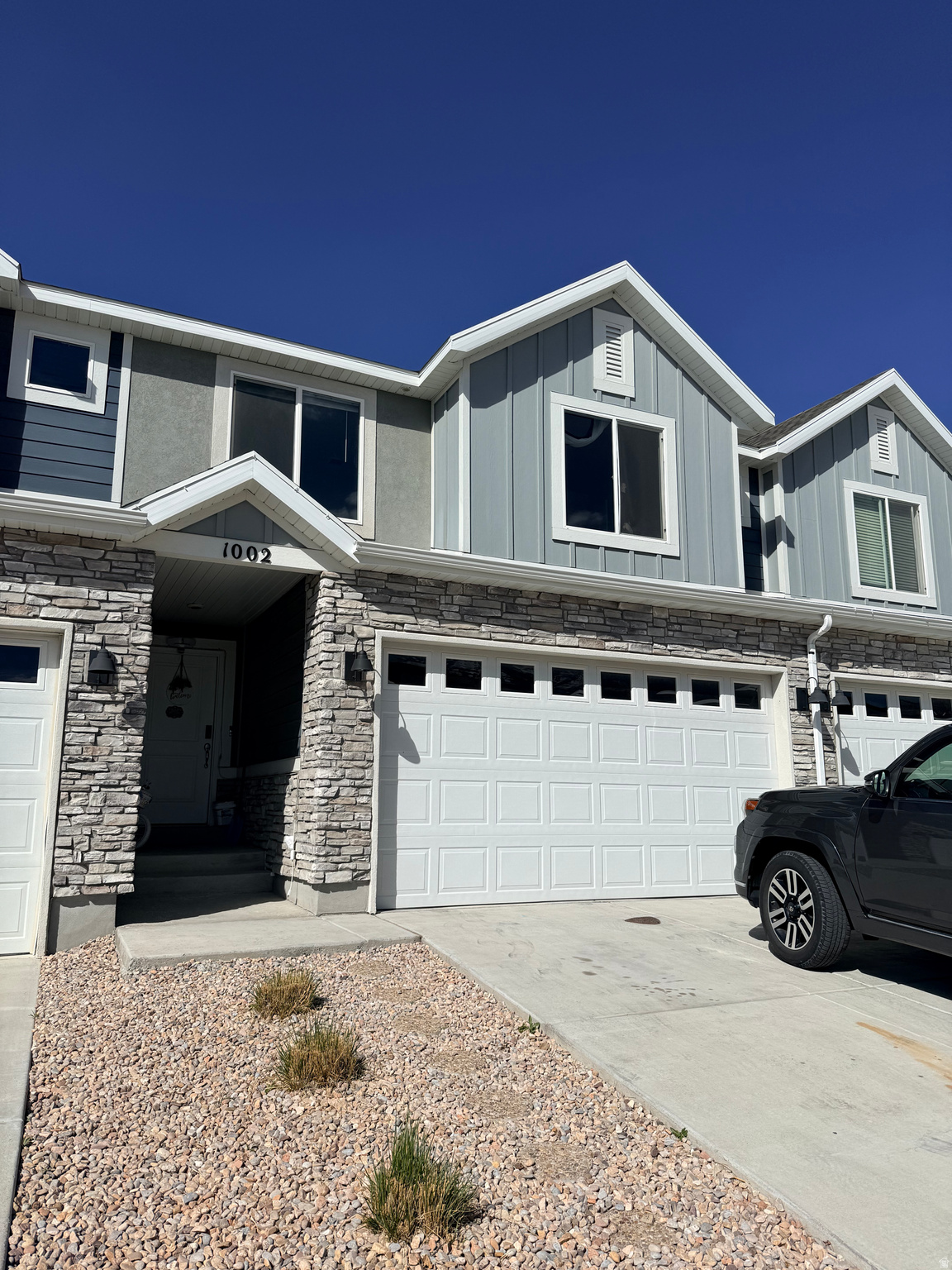 Welcome to this beautifully built 2021 townhouse in the growing community of Santaquin, Utah-offering the perfect blend of modern design, space, and versatility. With 5 spacious bedrooms and 4 full bathrooms, including a fully finished basement, this home is ideal homeowners. The open-concept main level features a bright and inviting family room that flows seamlessly into the kitchen, creating a functional space for entertaining and everyday living. Large windows bring in abundant natural light while showcasing stunning mountain views-one of Santaquin's most sought-after features. The fully finished basement expands the living area, offering additional bedrooms and bathrooms perfect for tenants, guests, or multi-generational living. This flexible layout allows for multiple living arrangements and income opportunities. Additional highlights include a 2-car attached garage.
