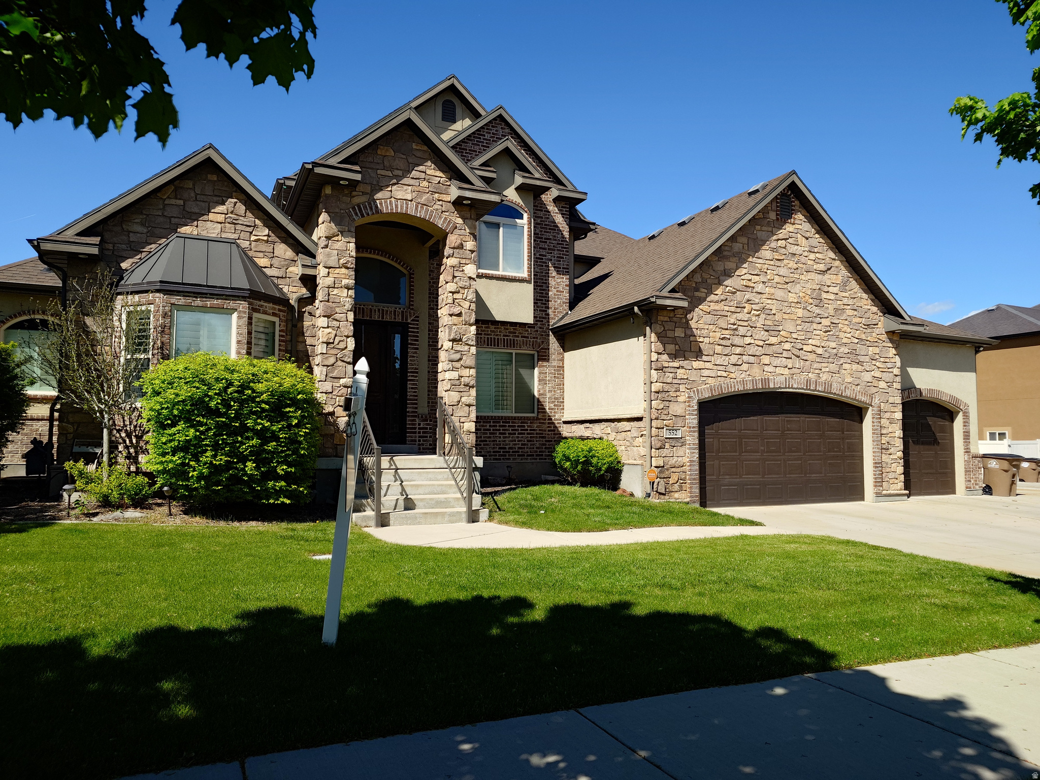 Beautiful home in established neighborhood near new $2 million dollar park with pickle ball courts, playground and soccer field. New carpet.  New paint in all but one guest bedroom and the theater room.  Gorgeous pool in back.   Just 4 minutes from the I-15 freeway.  Large open floor plan.  Fully finished basement with large built-in pool and deep RV parking.   With a theater room, and huge family room, your family will create lasting wonderful memories for years to come.  Kids splash pad fountain next to pool.  Hot tub, theater room equipment and pool table included.  :)