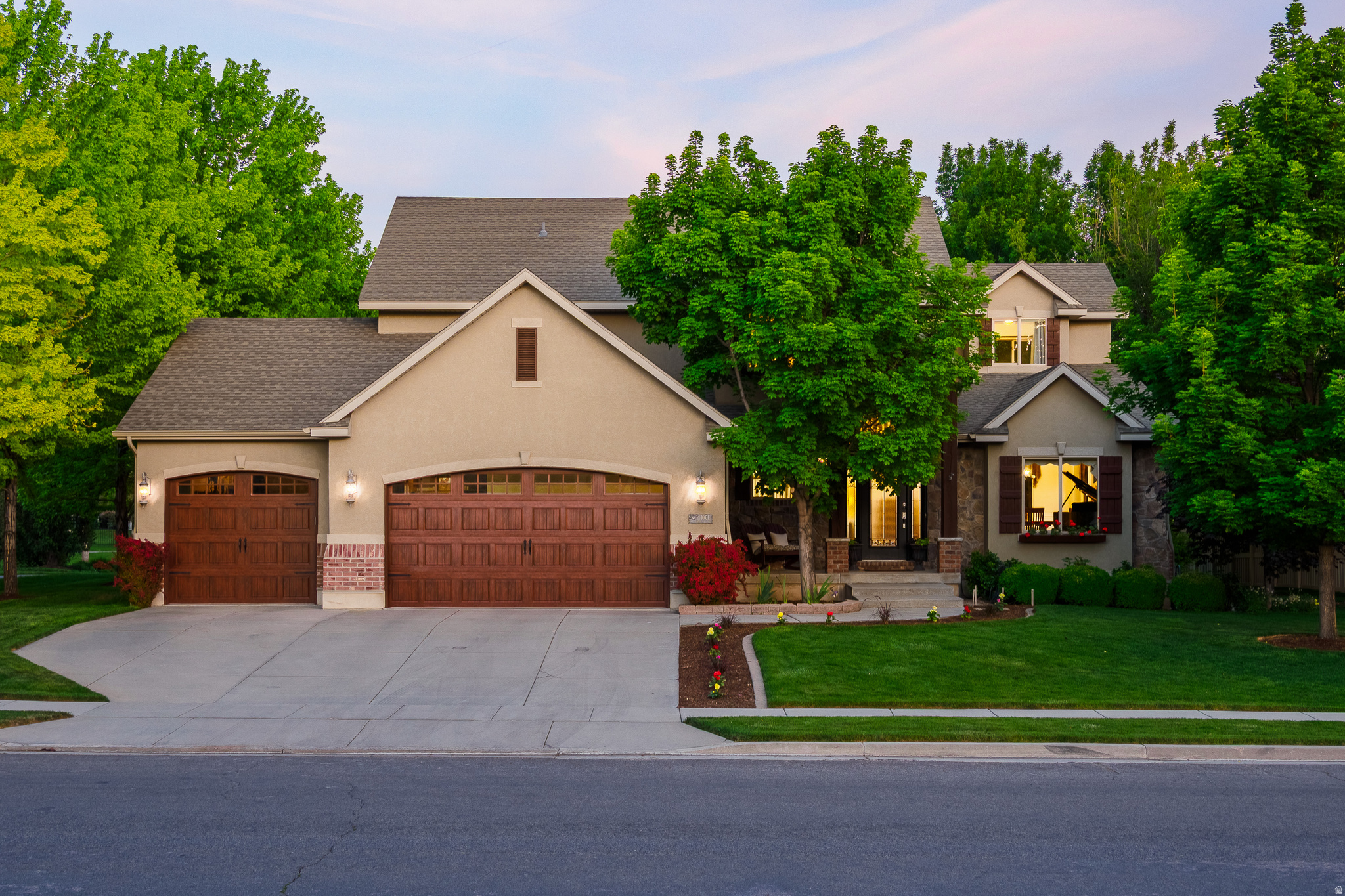 Immaculate 5 Bedroom, 3.5 Bathroom Home on a Premier Lot in one of Kaysville's Most Coveted Neighborhoods  Quail Hollow at Willowmere Farms * Backing Directly onto a Private 3-Acre HOA Park with a Pool, Playground, Basketball, and Volleyball as well as an Open Grass area, Covered Picnic Area, Bathrooms, & a Walking Path. * You'll Love the Breathtaking Mountain Views from the Deck, Backyard and Rear Windows * Spacious Open Great Room * The Updated Kitchen Features: White Stacked Cabinets, Granite Countertops, Tile Backsplash, a New Gas Cooktop, New Double Ovens, a New Refrigerator, an Island with Bar Seating, a Pantry, & Built in Desk * Huge Family Room with a Stone Fireplace & Natural Light * Spacious Primary Bedroom Retreat with Panoramic Window Views of the Mountains & Park  Vaulted Ceilings, Separate Jetted Tub & European Shower, Large Updated White Vanity with Double Sinks & Granite Countertops, & a Walk-In Closet * Three Additional Upstairs Bedrooms with Beautiful Views of Mature Trees (18 Trees on the Property) * Main Bathroom with Updated Vanity & Granite Countertops * Formal Living Room with Vaulted Ceilings * Formal Dining Room with Updated Wood Flooring * Fully Finished Basement * Family Room with a Thermostat Controlled Gas Fireplace, Custom Built-in Cabinets & Shelves, & Surround Sound Speakers * Extra Space in Family Room Area to Add a Kitchenette, a Game Area, or Bedroom/Den * 5th Bedroom & Full Bathroom in Basement * Custom Window Shades  * New Front Door * Brand New HVAC (2026) * New Roof (2019) * New Water Heater (2021) * Relax in your Park-like Backyard with a Deck & Pergola, Patio with a Gas Firepit, Cascading Waterfall Feature, Mature Trees, & Raised Garden Area * Great for Entertaining * Oversized 3-Car Garage with Updated Garage Doors & a dedicated Workbench * Plumbed for Central Vacuum * Indoor/Outdoor Dog Kennel *