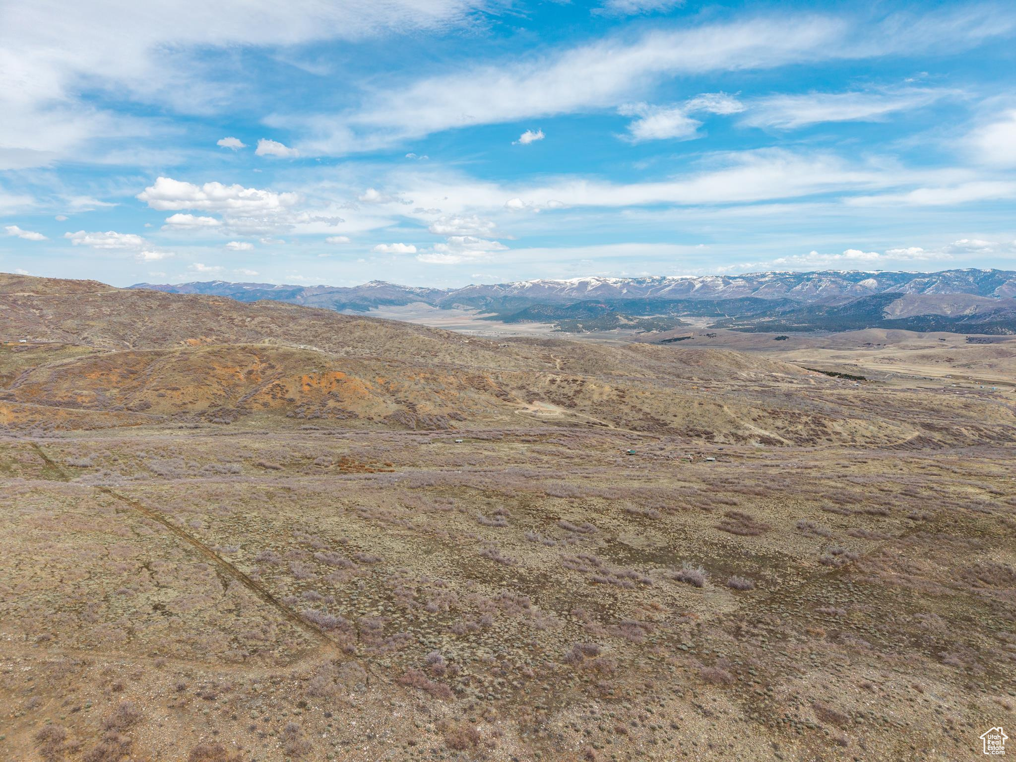 Looking for a property that you could hunt from? This property backs BLM land and to mention the size of this lot. 42.32 acres that has year round access. In good snow years you would need snow vehicles to get to the property. There is an easement that will take you back to the property which has a gate and is pictured in listing.  Call division of water rights to find out if there is water available for this area. This property comes as-is, no water rights included in the sale. This property was part of a wildfire years ago. All information provided is a curtesy and needs to be verified by buyer and buyers agent.
