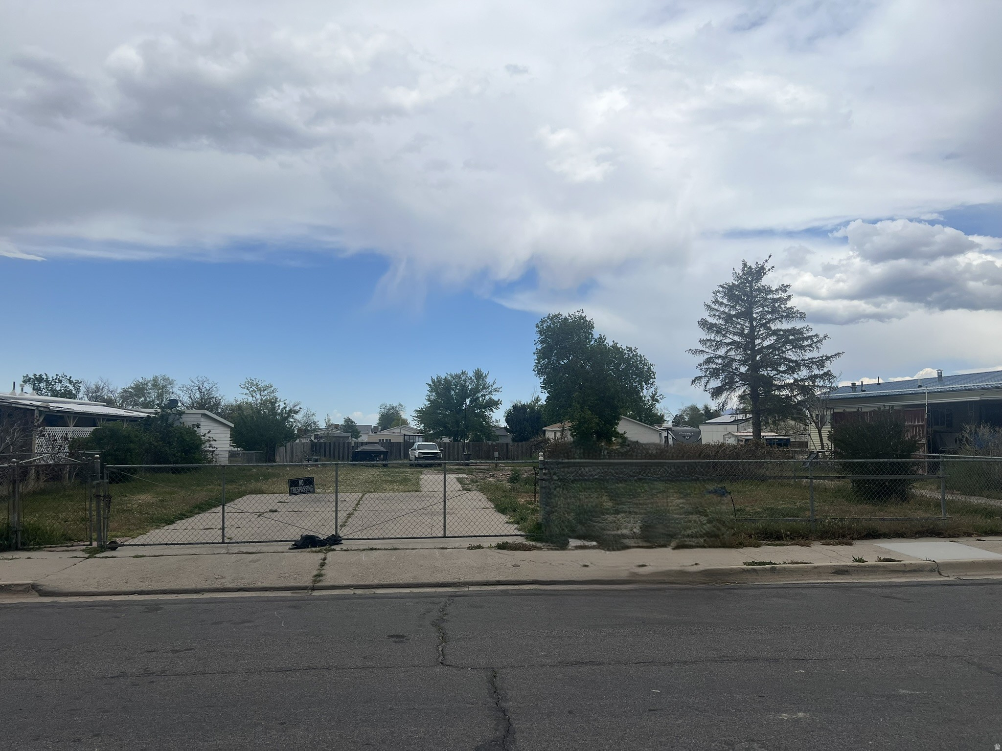 Nearly 1/3 acre fully improved building lot that previously had a manufactured home on it.  The manufactured home has been removed and the shed is in the process of being removed from the property. It should be gone in about 1-2 weeks. All utilities are in the lot. Zoned R1-7.