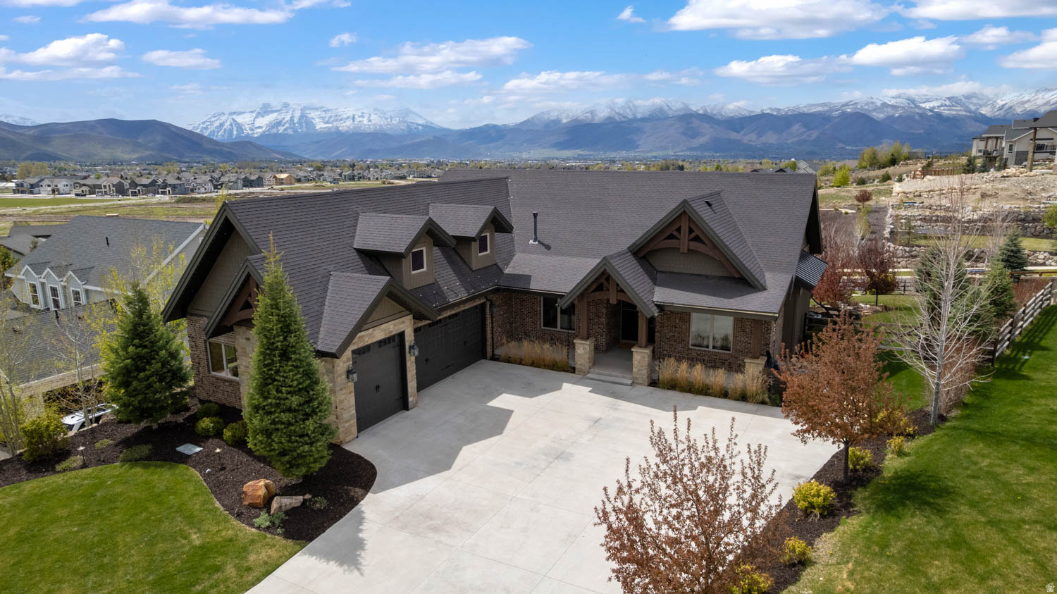 The Ultimate Retreat:  Experience a home that goes far beyond the standard luxury build. Located in the serene landscape of Heber City, this residence is defined by one-of-a-kind custom upgrades designed for security, wellness, and a high-end lifestyle. The "Hidden" Luxuries What sets this property apart are the high-value "bonus" features integrated into its design: Private Wellness Center: Unwind in your own built-in sauna, offering a spa-quality experience without leaving home. Includes a 500-gallon water storage system fully plumbed into the house, alongside a whole-home humidifier integrated into the HVAC system for year-round comfort. The property is fully enclosed by a classic split-rail cedar fence and features a dedicated box garden area, perfect for farm-to-table living. Holidays are extra special with programable lighting.  Culinary Excellence & Entertaining Whether you are hosting a gala or a quiet family brunch, the dual-kitchen layout offers unmatched versatility: Professional Main Kitchen: Equipped with commercial-grade appliances, a large "walk-in" pantry with motion lighting, and instant hot water at the tap. Secondary Suite: The walk-out basement features a second full kitchen, making it an ideal space for long-term guests or effortless indoor-outdoor entertaining. Spa-Inspired Bathrooms Every bathroom in the home is an experience in modern automation and comfort: Master Sanctuary: Step onto heated floors and enjoy the luxury of a heated towel bar. Intuitive Design: All bathrooms feature motion-activated lighting for seamless navigation. Deep Relaxation: The lower level includes an extra-large soaking tub, perfect for recovering after a day in the Utah mountains.
