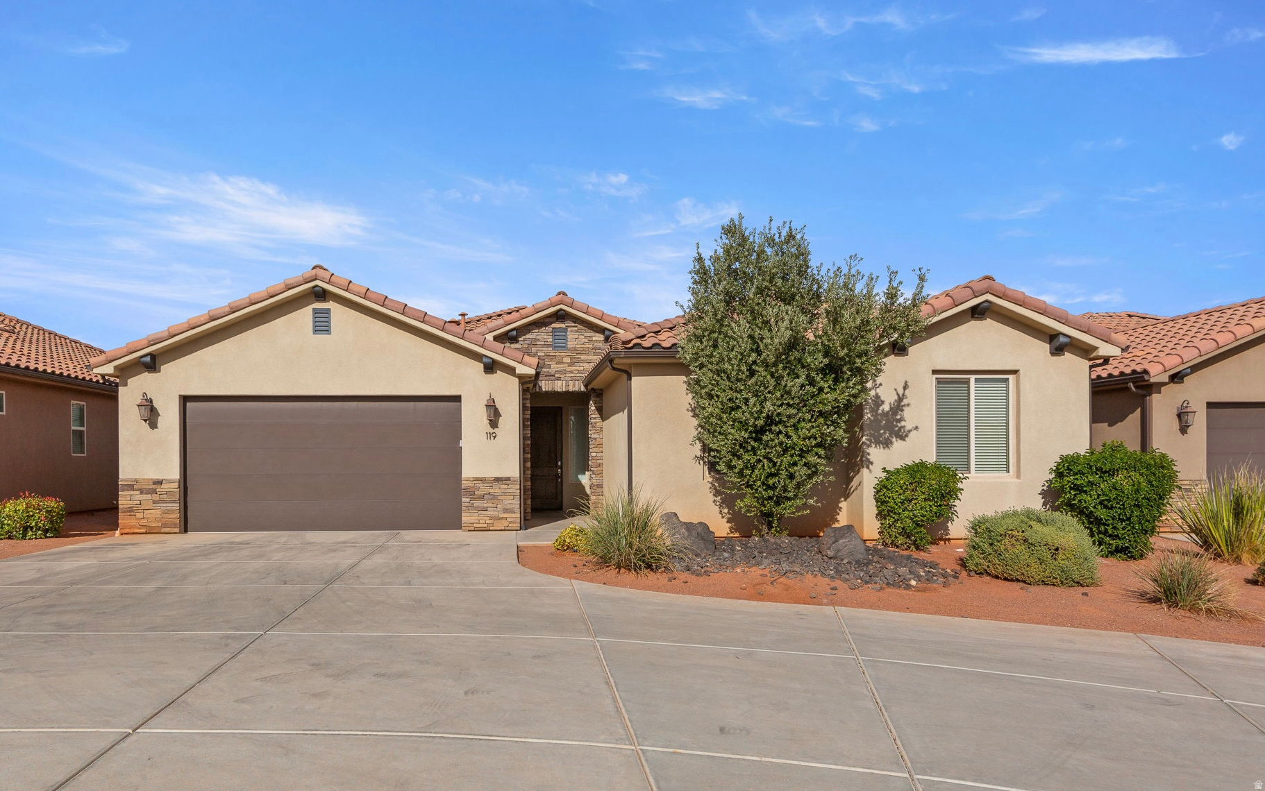 Nightly Rental Approved! This single family rambler is turnkey ready with 5 bedrooms & 5 bathrooms- located in the highly desirable Paradise Village community in Santa Clara. One of the only 5/5 single detached homes in the neighborhood- this spacious property is near the pool and offers an open floor plan, modern finishes, and plenty of natural light throughout. Enjoy a quiet backyard with a private hot tub-perfect for relaxing after a day of adventure. As part of Paradise Village, you'll have access to amazing amenities- including resort-style pools with water slides and a lazy river, hot tubs, a fitness center, pickleball courts, playgrounds, and walking trails. This home is being sold as turnkey ready for nightly rentals and ideal as a second home and/or investment property.
