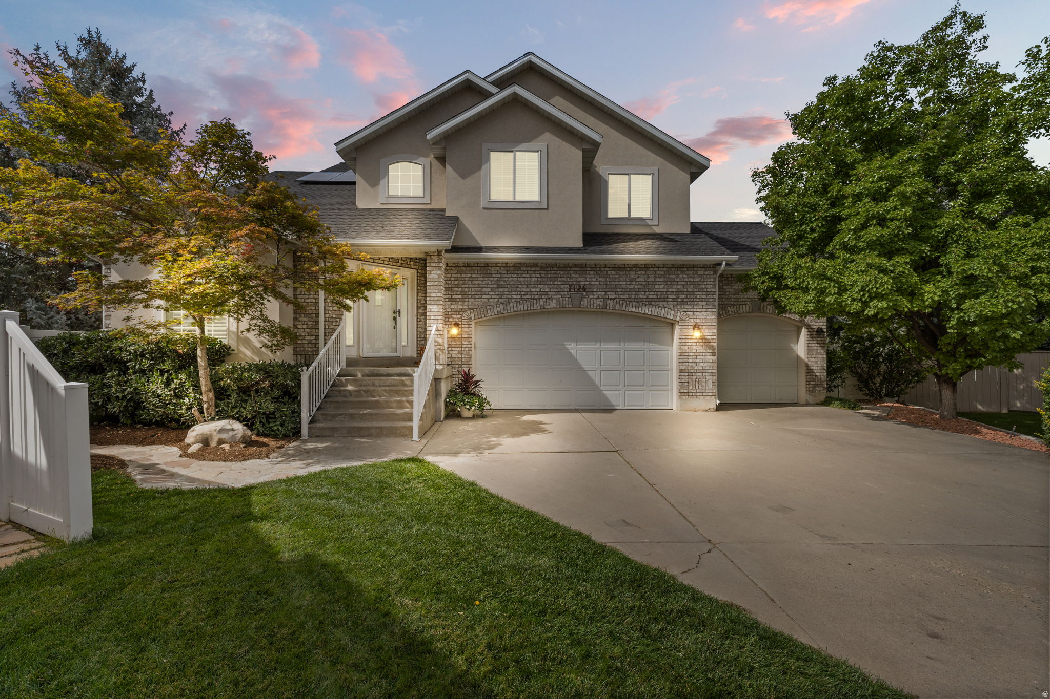 Just minutes from Big and Little Cottonwood Canyon, you'll enjoy the lifestyle that draws so many to this area. First tracks on powder days, evening hikes after work, and year-round recreation just moments from home. Yet everyday convenience remains unmatched, with quick freeway access, nearby parks, highly regarded schools, and local favorites like Alpha Coffee and Lone Star Taqueria only minutes away...  Inside, vaulted ceilings and abundant natural light welcome you into the formal living and dining spaces, while the kitchen, breakfast nook, and family room complete the thoughtfully designed floor plan that is perfect for living well. Four bedrooms and two bathrooms, including the amazing master suite, are located upstairs, while the basement includes a full ADU with a separate entrance offering excellent flexibility for guests, multi-generational living, or strong rental income potential. Outside, the home sits on .28 acres of pristine landscaping, fruit trees, garden boxes, a playground, and plenty of space to entertain and enjoy the outdoors. To top it off, the solar panels help keep electricity costs remarkably low at approximately $21 per month and other major updates provide peace of mind, including a new roof (2024), high-efficiency furnace and A/C upstairs (2024), new garage door motors (2025), and much more in this well cared for home...  If you're searching for the Cottonwood Heights lifestyle, schedule a showing and experience this home for yourself.