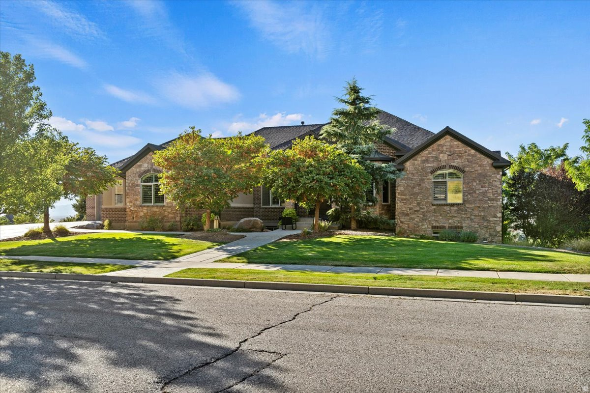 WHAT ARE YOU WAITING FOR?? Your NEW home is ready for you! With over 7,000 Sq. Ft, Incredible Mountain and Valley views * Plenty of room for everyone! 7 Bedrooms, 5 Bathrooms * 2 kitchens * 2 Laundry Hookups * Separate Back entrance * Huge Room that could be a Theater room, Exercise Room, Salon, Pre school, You name it, it can probably be that! * Vaulted ceilings * Granite countertops * Double sided fireplace in the Great room and out on the Deck * Words don't describe how beautiful Your NEW home is! * four-car epoxy-floored garage (with a heated bay) and massive storage areas provide the space you've been craving * Come take a look and feel the space of your NEW Home!!