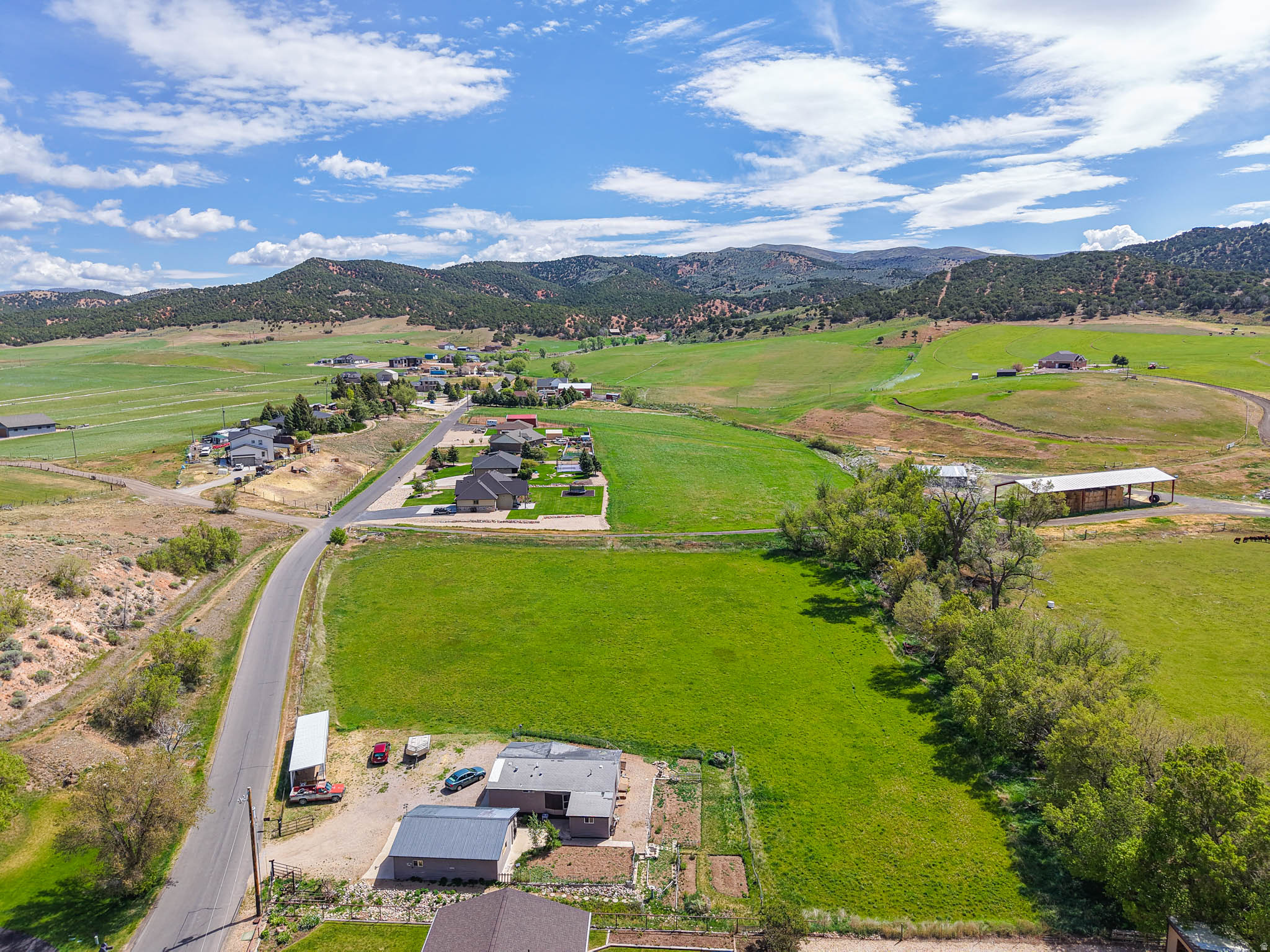 THAT THREE-ACRE PIECE OF HEAVEN IS HERE IN HOYTSVILLE**  Located at the base of Spring Canyon, this verdant parcel is perfect for building your relaxing homestead or a legacy family retreat* The Primary value is in the land* The structure is a manufactured home* This location affords easy access from I-80, and is just 45 minutes from Salt Lake International Airport*  It's time to come home to Hoytsville!*