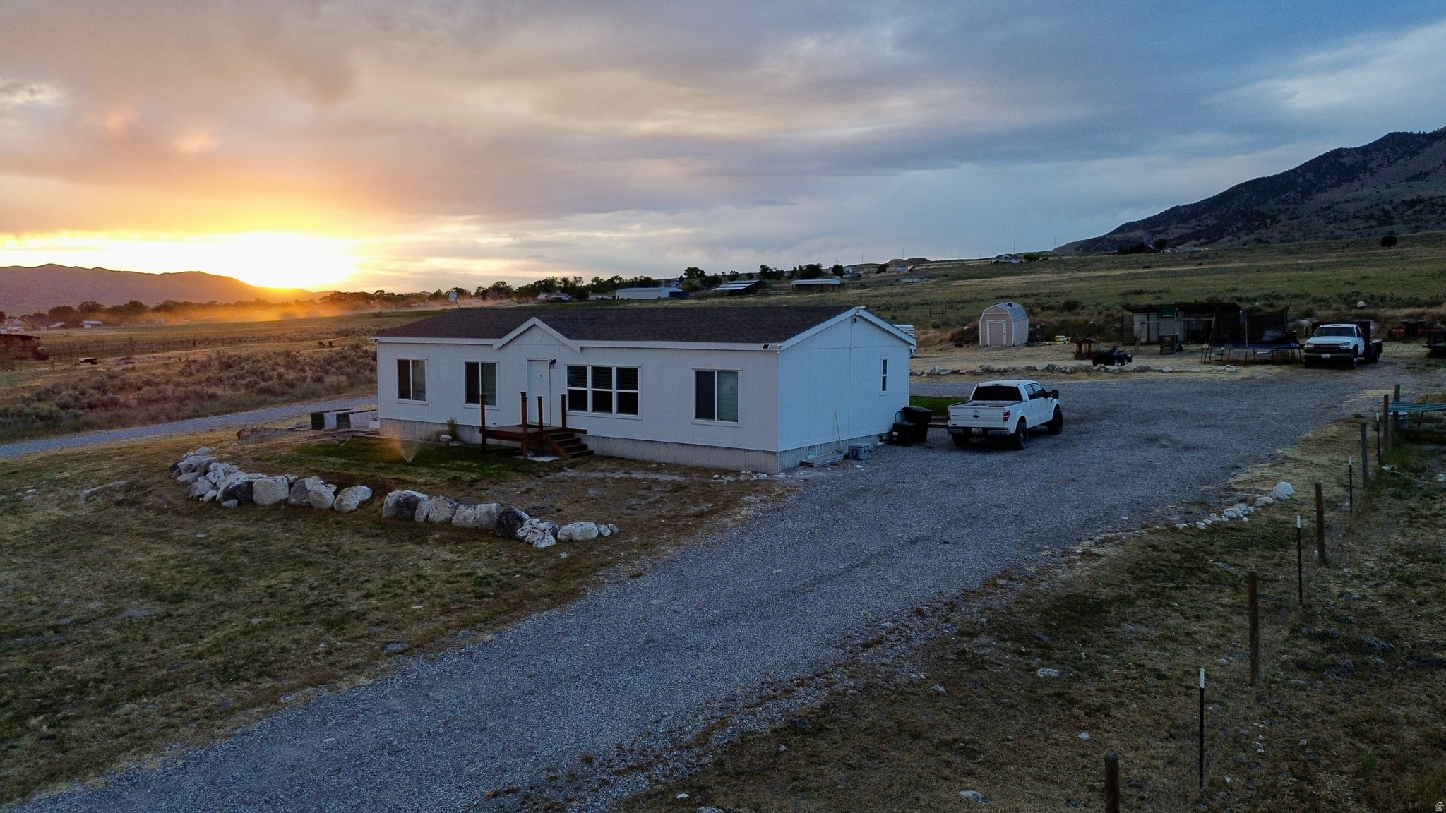 Dream views on a  4-Acre Turnkey Homestead! Modern 2019 3BR/2BA open-concept home. Perfect for hobby farmers & animal lovers: includes 2 fenced pastures, 6 horse stalls, livestock pen, chicken coop, and dog runs. Country peace with modern convenience!