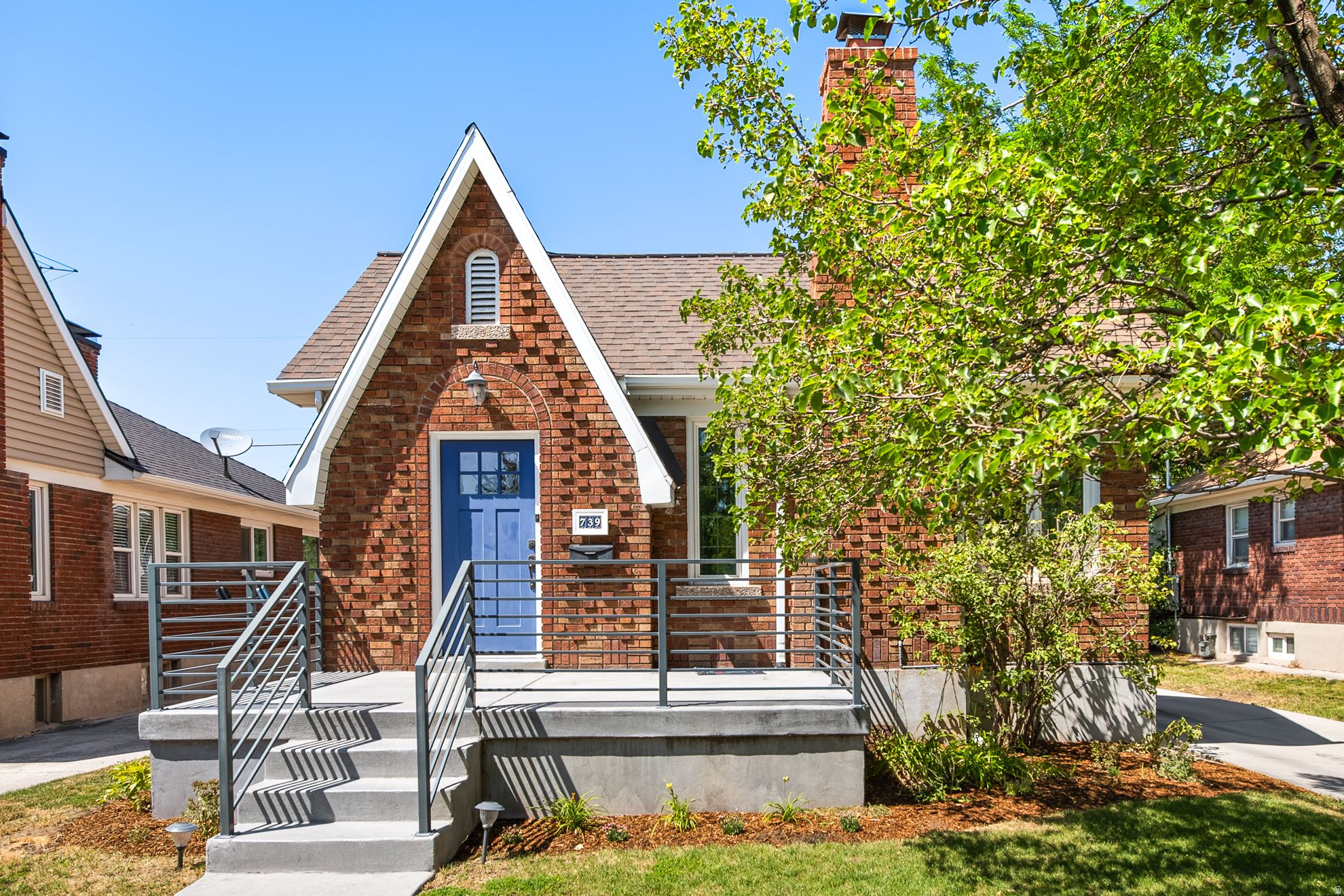 Charm and character abound in this beautifully updated Tudor in the highly sought-after 9th & 9th/Sugar House neighborhood! Thoughtfully remodeled while preserving its timeless Tudor charm, this home seamlessly blends classic architectural details with modern updates. Custom features include double-pane, leaded-glass insulated vinyl windows, elegant coved and vaulted ceilings in the living and dining rooms, and an original tiled fireplace that serves as a stunning focal point.  The like-new hardwood floors shine throughout the main level, leading to a beautifully remodeled kitchen featuring white shaker cabinetry, granite countertops, a striking tiled backsplash, and stainless-steel appliances. Both the main-level and lower-level bathrooms have been exquisitely remodeled with designer finishes you'll love.  The bright and inviting lower-level family room offers additional living space with plenty of natural light. Outside, you'll find a private backyard complete with an oversized deck-perfect for relaxing, entertaining, or enjoying Utah's beautiful seasons. This exceptional home has been lovingly maintained, is easy to show, and is sure to impress. Show with confidence and pride!