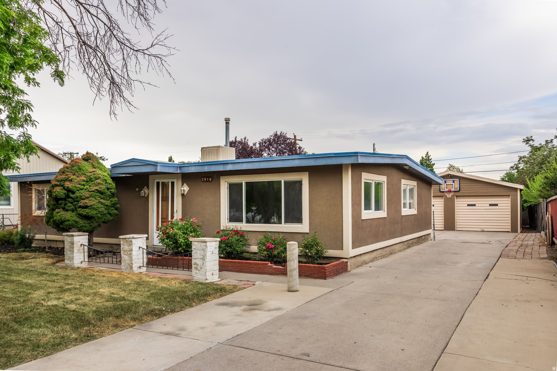 2916 Lehi Drive may look small from the street, but don't let that fool you! This home is well equipped with four nicely sized bedrooms, two family rooms, ample parking, a large 2-car garage, fully fenced yard, and great landscaping. The oversized garage has an extra space in it that would be a great ADU! It also has additional storage behind it. Yard is equipped with fully automatic sprinkler system and separate garden area. This home has a wonderful layout and will give your family room to spread out! Easy access to freeways, restaurants, and shopping. Come check it out today!
