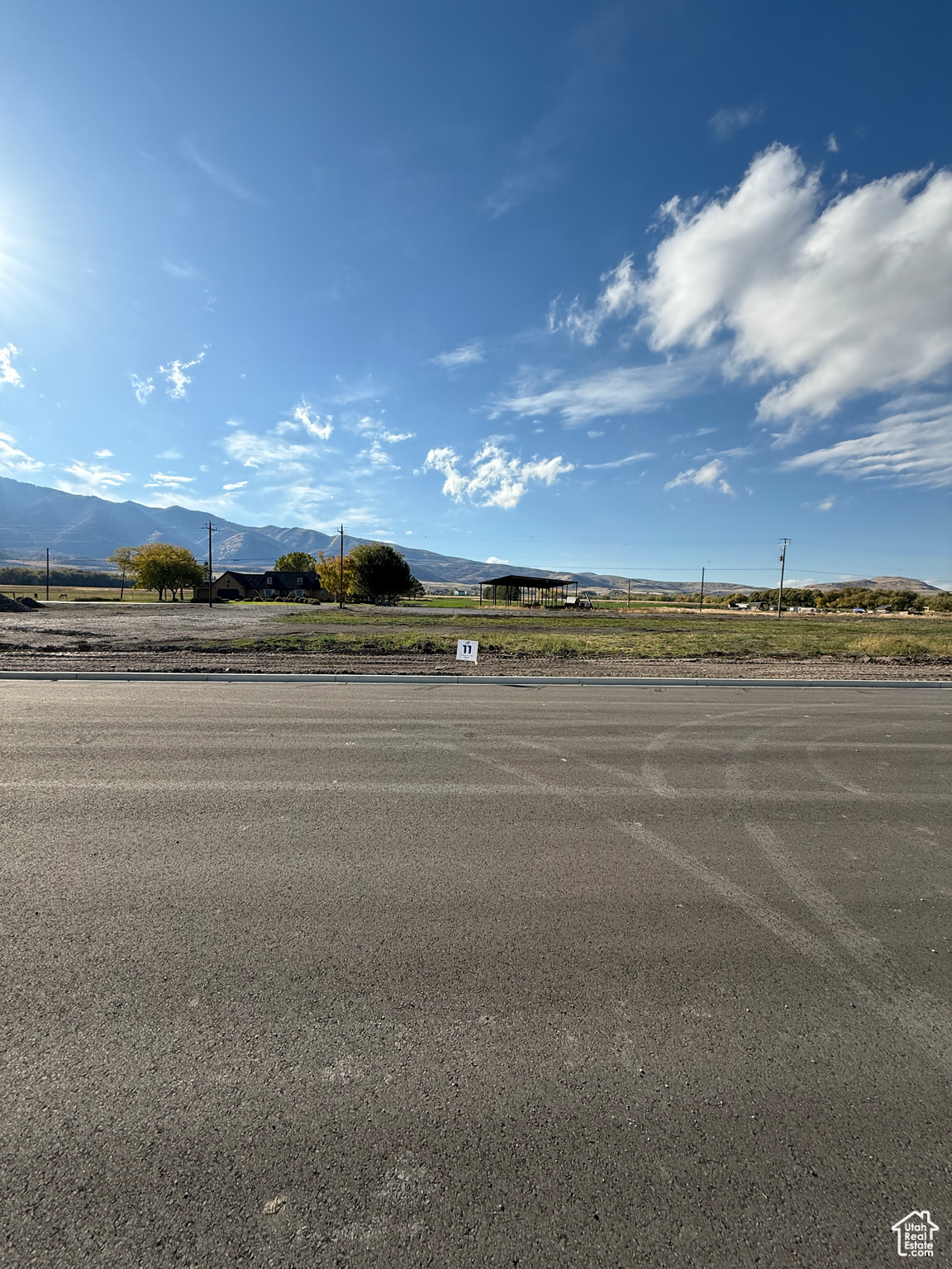 Bring your own Builder! Multiple lots available - Build your dream home in the peaceful and scenic community of Mendon. Blueberry Springs offers spacious 5/8+acre lots with breathtaking views of the mountains and valley. Enjoy paved public roads and full utility access, including Mendon City water, data, power, and secondary water stubbed to each lot. Irrigation water is managed and maintained by the Blueberry Springs HOA. Buyers are responsible for choosing and installing a septic system, subject to approval by Cache County. Each lot includes curb, gutter, and sidewalk frontage. This subdivision allows animal rights in accordance with Mendon City ordinances (https://mendoncityutah.gov). Bring your own builder and design your ideal home while adhering to city setbacks and protective covenants that maintain the neighborhood's appeal.