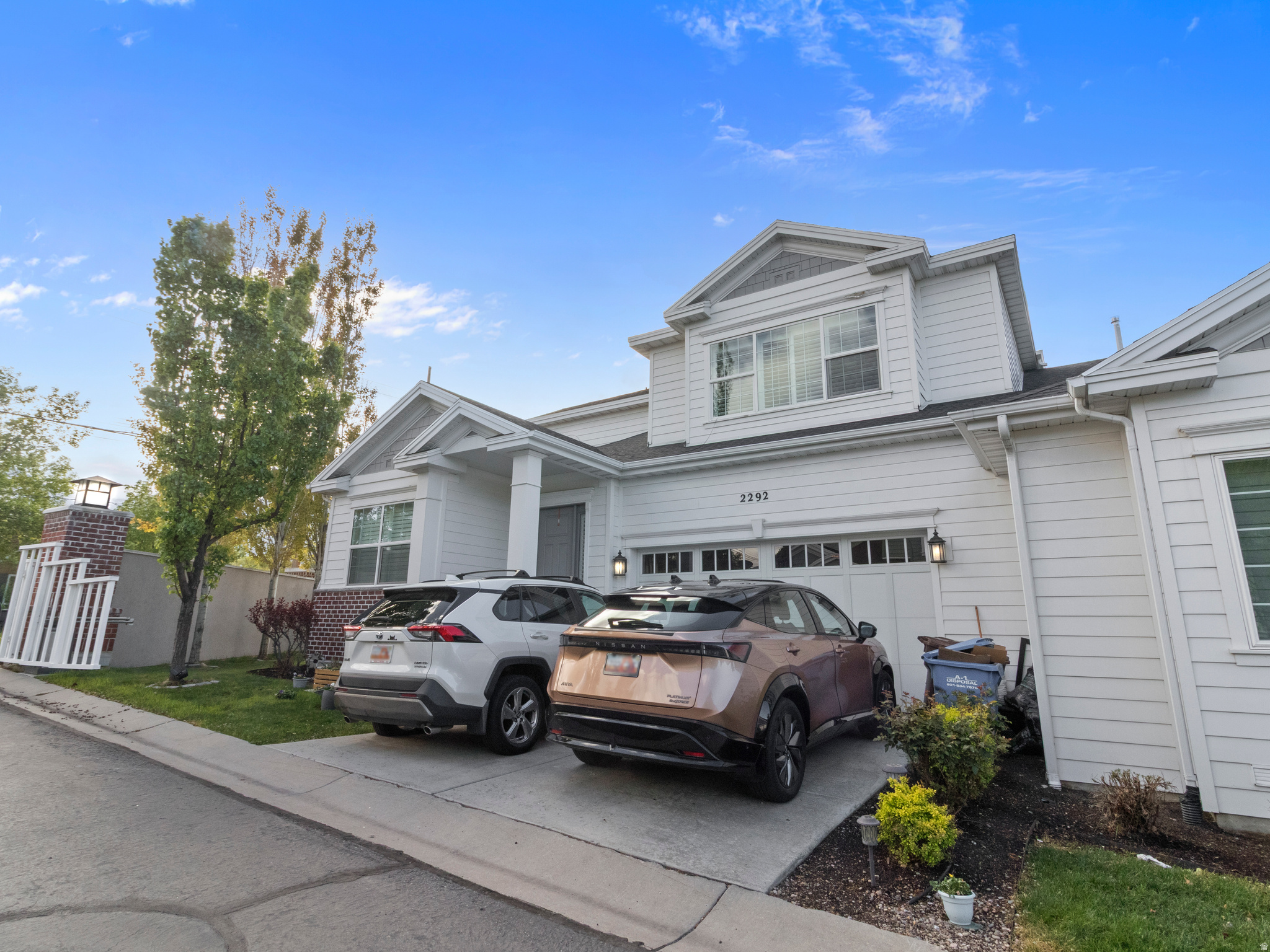 This stylish, fully-finished two-story townhome is Millcreek's highly sought after neighborhood... The Hamptons! Move-in ready, it offers 4 BR/3.5 baths plus an in-home office set in an open floor-plan with tons of windows and natural lighting. Enter through a wide 14 foot-tall entry to an adjacent library with double doors, bookshelves and large storage closet. The airy hallway flows into an entertainer's kitchen and backyard access with mountain views. Host effortlessly in a bright, modern kitchen with quartz countertops, stainless steel Whirlpool and Samsung appliances.  Ample storage in slow-close shaker cabinets, drawers and a very large pantry are augmented by an island with a double-sink. The adjoining great room features extra high ceilings, recessed lighting, a fan and an enclosed gas fireplace surrounded by mosaic tile and wood mantle. A spacious, secluded, spa-like second floor master suite features an oversized, light-bathed bedroom with mountain views and storage in a sleek, mirrored wall-mounted wardrobe.  A large, luxurious en-suite bathroom features a ceramic-tiled shower, soaking tub with jets, enclosed toilet, oversized his and her sinks with quartz countertops and tons of storage, as well as a large walk-in closet. A second upstairs bedroom also has a full en-suite bath and faces the Wasatch mountains. A finished basement features two additional bedrooms, a full bath, a cozy family room, egress windows and 2 large storage spaces.  The 2-car garage with built-in storage is accessed via the 1st floor laundry room (appliances included). A lovely, fenced-in backyard affords outdoor relaxation and entertainment with a garden, TREX deck off the kitchen with amazing views of Mt. Olympus. Built in 2017, the roof, appliances and mechanicals are all in great condition. Terrific local businesses like Retro Betty clothing, Roots Cafe, Provisions, Over the Counter Cafe and Maria's are walking distance.  Several grocery stores, retail shops and Millcreek Commons are all only minutes away.  This gated community is three blocks to Olympus High School and Evergreen Junior High and has easy access to biking/hiking in Millcreek and Parley's Canyons.  Pet parents will enjoy proximity to parks, dog and cat centric stores and Tanner dog park. The Hamptons is also close to 23rd, 33rd and 39th, and to I-80 and I-215, which bring you to the ski resorts, or to downtown.  Hurry home to the Hamptons!