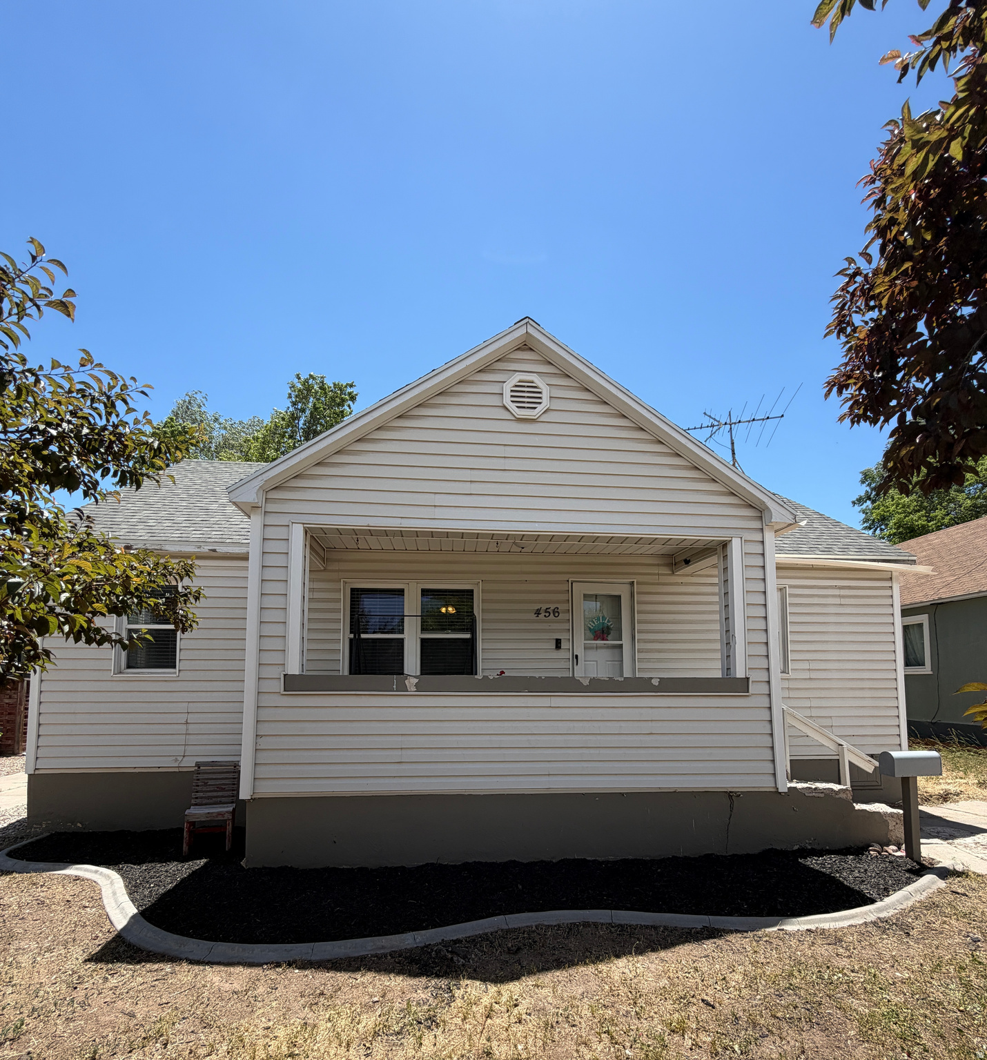 This home is a must see!!  Close to Library and downtown.  Backyard is fully fenced with so much potential and Mature Trees, sprinklers in the backyard.  3 Bedrooms and 1 Bathroom.  Flooring has been updated- this home is ready for you to make it yours and enjoy your evenings on the front porch.   Square footage figures are provided as a courtesy estimate only.   Buyer is advised to obtain an independent measurement.