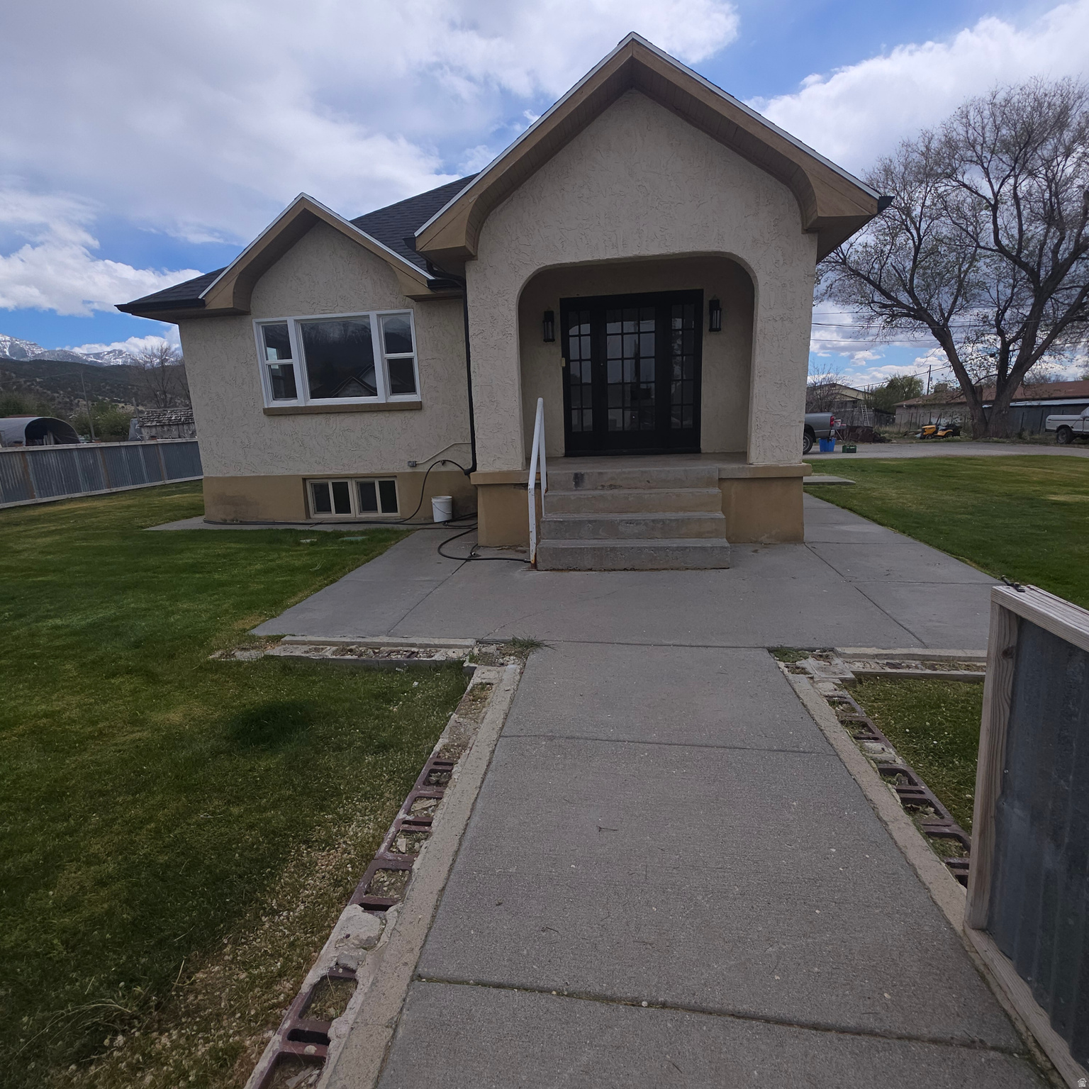 Darling affordable bungalow ready to move in.  recently updated.  private yard with easy access to park all of your toys.
