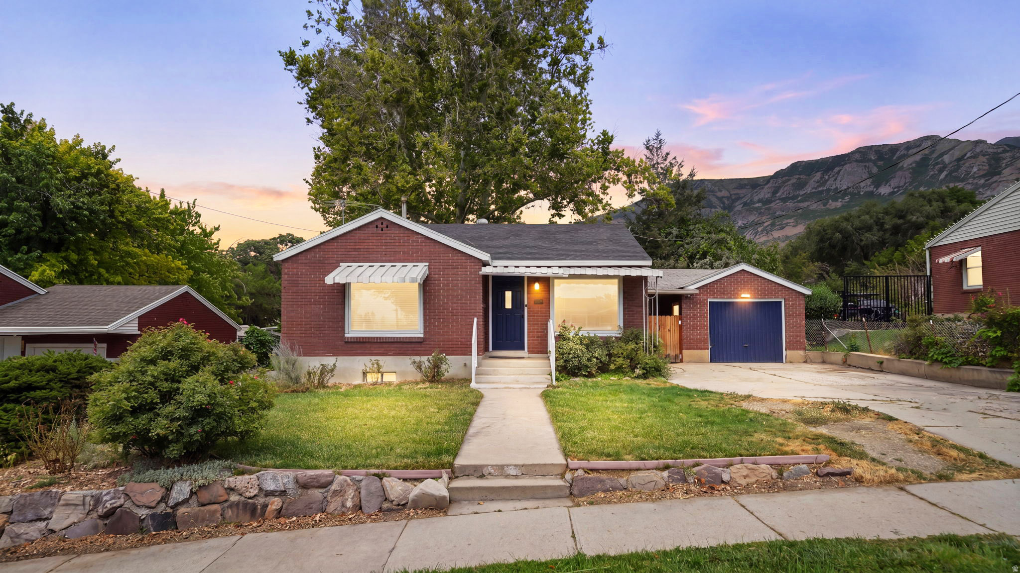 Beautifully updated home on a spacious lot in the heart of Pleasant Grove! This move-in-ready property combines modern updates with timeless charm and stunning mountain views. Inside, you'll find fresh paint, brand-new carpet, and an updated kitchen featuring new appliances, creating a bright and inviting space that's ready to enjoy. Major improvements provide peace of mind, including a new furnace, water heater, A/C condenser, roof (2020), windows (2020), and a separate basement entrance. Step outside to a large, beautifully maintained yard with mature fruit trees, a generous garden area, and plenty of space to relax, entertain, or play. Enjoy the convenience of being just minutes from schools, parks, shopping, dining, and freeway access while still feeling tucked away in an established neighborhood. Extensive updates, oversized lot, incredible mountain views, and unbeatable location.