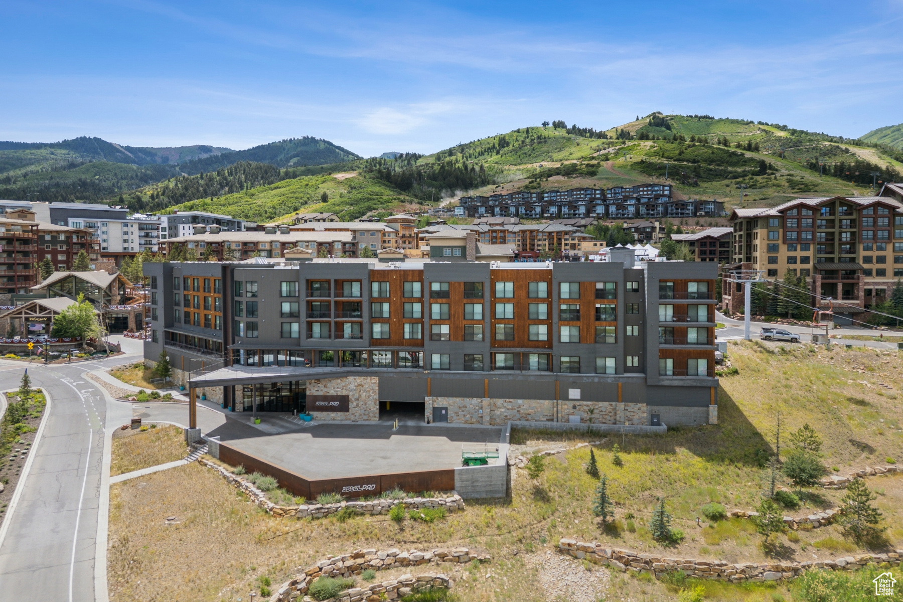 Discover this exceptional YotelPad in Canyons Village. Enjoy stunning eastern-facing views of the Uintah Mountains. Located in the heart of Canyons Village, you'll have easy access to dining, shopping, golf, skiing, hiking, and seasonal concerts. The smart European design features a queen Murphy bed, two bunks, and extensive storage throughout. The kitchen includes a two-burner cooktop, microwave, full refrigerator, and quartz countertops. This fully furnished unit includes a garage storage closet and one heated underground parking space. YotelPad amenities feature full concierge service, year-round pool and hot tub, equipment valet with boot drying and ski storage, laundry facilities, and indoor/outdoor gathering spaces. Modern conveniences like app-based snack ordering and contactless check-in make your stay effortless. Experience premium mountain living with these magnificent eastern mountain vistas.
