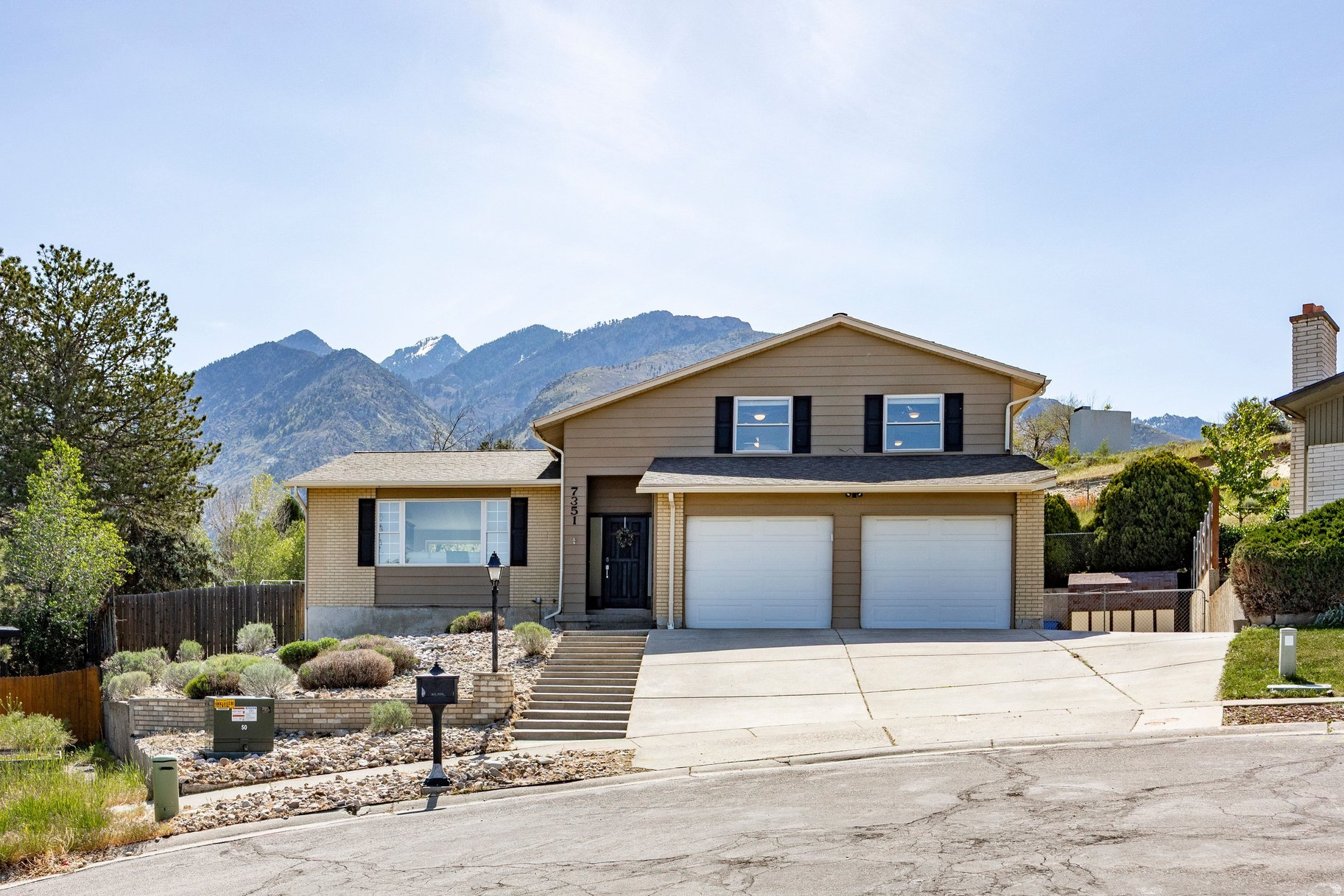 Perched at the top of a quiet cul-de-sac, this Cottonwood Heights tri-level offers privacy, views, and an ideal layout for both everyday living and entertaining. A beautifully remodeled kitchen opens the floor plan, creating seamless flow between the living spaces while capturing stunning valley and mountain vistas from the kitchen, living room, and upstairs bedrooms.  Set on an expansive pie-shaped corner lot, the outdoor space is just as impressive-featuring a spacious deck, covered patio, fenced yard, and convenient RV parking. With no neighbors behind, enjoy added privacy along with the sounds of summer evenings and neighborhood baseball from nearby Bywater Park.  Upstairs, the primary suite includes a private en suite bath, while two north-facing bedrooms showcase unobstructed valley views. Walk to the park's new tennis courts, playground, and open green space, and enjoy proximity to the Cottonwood Heights Recreation Center with its indoor and outdoor pools.  Ideally located near Big Cottonwood Canyon and Ferguson Canyon, you'll have quick access to year-round recreation while avoiding canyon traffic. Commuting is effortless with excellent access to Interstate 215 just minutes away, making this location as convenient as it is scenic.