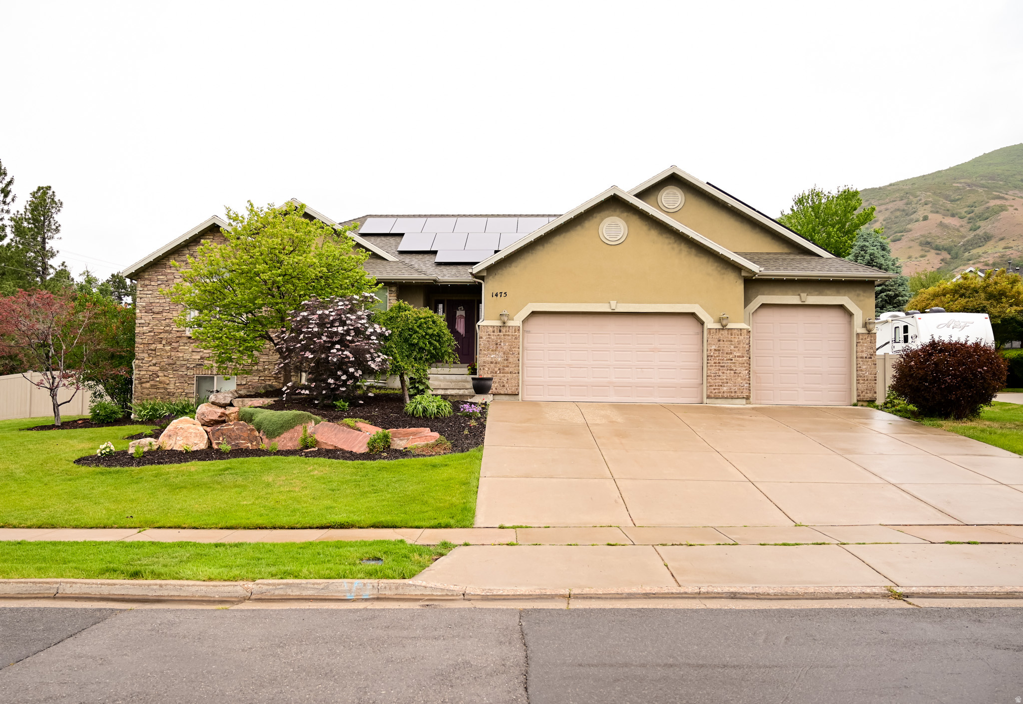 Welcome to this beautifully maintained 5-bedroom home in a quiet Fruit Heights neighborhood, offering a perfect combination of comfort, thoughtful upgrades, and versatile living spaces with convenient access to outdoor recreation. This flexible floorplan features a basement mother-in-law apartment with a separate entrance, creating multiple living options ideal for extended family, guests, rental potential, or multi-generational living arrangements.  Basement is currently on a month-to-month rental for about $1700/month - renters would be willing to stay contingent on terms.  Located near Nicholl's Castle Park and the Gailey Trail, this home provides easy access to some of the area's best recreation opportunities, including Fruit Loops Mountain Bike Park, Kaysville Wilderness Park, and numerous hiking and biking trails. Convenient access to Highway 89 and I-15 places shopping, dining, entertainment, hospitals, and Hill Air Force Base just minutes away.  Square footage figures obtained from county records. Buyer is advised to obtain an independent measurement.