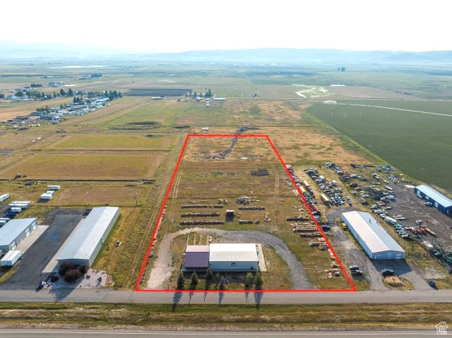 INCREDIBLE BUSINESS OPPORTUNITY!! This 6,000 square foot building, set on 7.45 acres, is located in the Montpelier Industrial Park. High traffic area just off of Hwy 30. The building is 2,000 ft office space and 4,000 ft warehouse. The business possibilities are endless!!   This property is the home of Natural Rock Designs (formerly Bear Lake Stone). If you are interested in buying the business (name, website, stone inventory, sand blasting equipment, etc.), in addition to the building and property, here's your chance!! Contact the listing agent for details.    **Property is NOT for lease/rent** Buyer to verify all information.