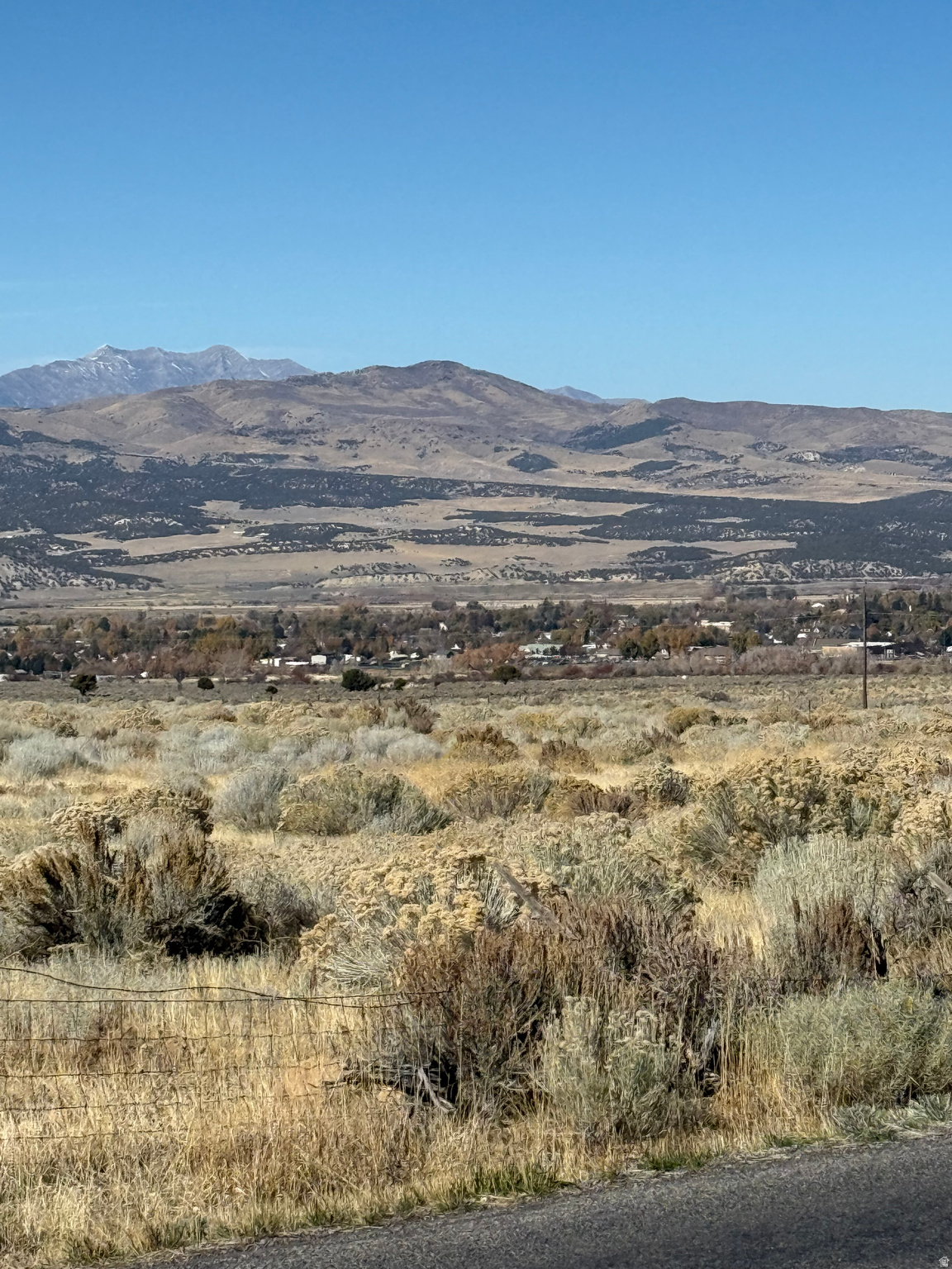 Located just outside of Mount Pleasant, this beautiful 5-acre parcel sits at the base of the stunning Skyline Drive mountain range, offering peaceful surroundings and incredible panoramic views. Enjoy the balance of seclusion and convenience just 1.5 hours from Salt Lake City, 45 minutes from Interstate 15, and only 10 minutes from Skyline Mountain Resort & Golf Course. A great spot to build, relax and take in the best of Utah's mountain living. Power is located near the front of the lot and the property includes access to a shared well.