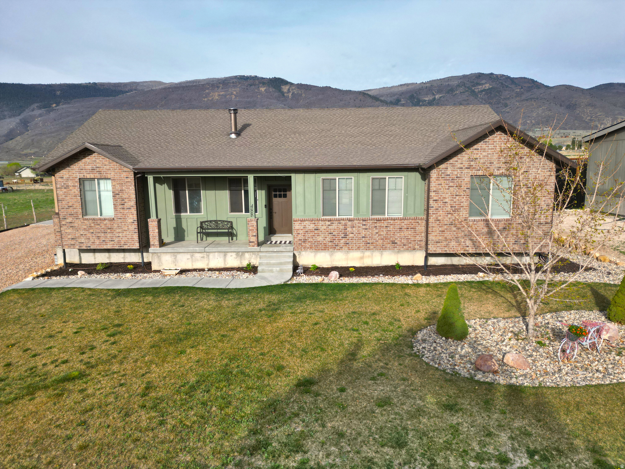 Welcome to this beautifully built 2019 ranch-style rambler, offering the perfect blend of cozy charm and modern open-concept living. Situated on a spacious lot on the southern end of Fountain Green. Inside, you'll find a thoughtfully designed layout with 6 large bedrooms and 3.5 bathrooms, providing plenty of space for family, guests, or flexible living needs. The main living areas feature a warm, inviting aesthetic, highlighted by a wood-burning stove in the front room.  The open-concept kitchen is a true centerpiece, complete with a large island, generous pantry, and seamless flow into the main living areas-perfect for everyday living and entertaining. Downstairs, a fully equipped second kitchen opens the door for multi-generational living or potential rental income, with the option to add a private exterior entrance for a completely separate living space.  Additional features include a spacious laundry room, functional mudroom, and oversized living areas both upstairs and down.  Outside, offers space for horses or other livestock, giving you the freedom to enjoy country living while still being conveniently located just 15 minutes from Nephi and easy freeway access.  If you've been waiting for a rare opportunity in Fountain Green, this is it-space, versatility, and small-town charm all in one exceptional property.