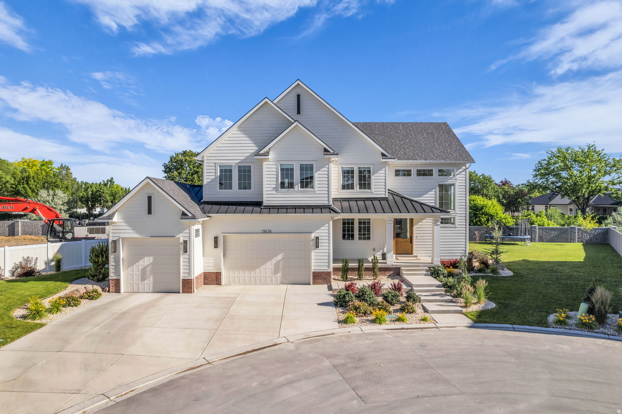 Rare opportunity to own a nearly new home in one of Riverton's most desirable neighborhoods! This stunning home features a vaulted great room filled with natural light from expansive windows. The main floor is designed for entertaining, offering an open gathering area and a beautiful chef's kitchen with an oversized 10-foot island, upgraded double oven, gas cooktop and high-end refrigerator. Situated on a private 1/3 acre creekside lot, the fully landscaped backyard features a covered patio and no direct rear neighbors. The finished basement includes a kitchenette, two bedrooms, a full bathroom and family room. The luxurious primary suite serves as a private retreat with dual vanities, a built-in makeup vanity and a huge walk-in closet. Tucked away in a quiet cul-de-sac with no immediate backyard neighbors and away from busy roads, this exceptional home offers the perfect combination of privacy, space, and modern upgrades throughout. HOA fee includes culinary and secondary water.