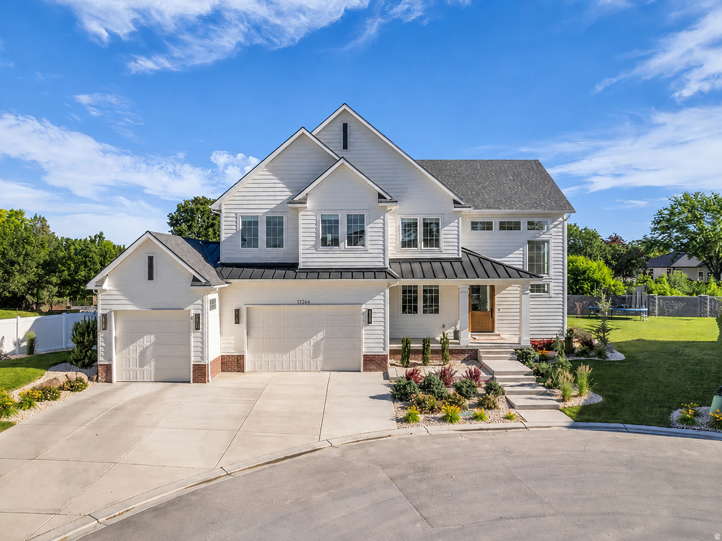 Rare opportunity to own a nearly new home in one of Riverton's most desirable neighborhoods! This stunning home features a vaulted great room filled with natural light from expansive windows. The main floor is designed for entertaining, offering an open gathering area and a beautiful chef's kitchen with an oversized 10-foot island, upgraded double oven, gas cooktop and high-end refrigerator. Situated on a private 1/3 acre creekside lot, the fully landscaped backyard features a covered patio and no direct rear neighbors. The finished basement includes a kitchenette, two bedrooms, a full bathroom and family room. The luxurious primary suite serves as a private retreat with dual vanities, a built-in makeup vanity and a huge walk-in closet. Custom window coverings throughout! Tucked away in a quiet cul-de-sac with no immediate backyard neighbors and away from busy roads, this exceptional home offers the perfect combination of privacy, space, and modern upgrades throughout. HOA fee includes culinary and secondary water.