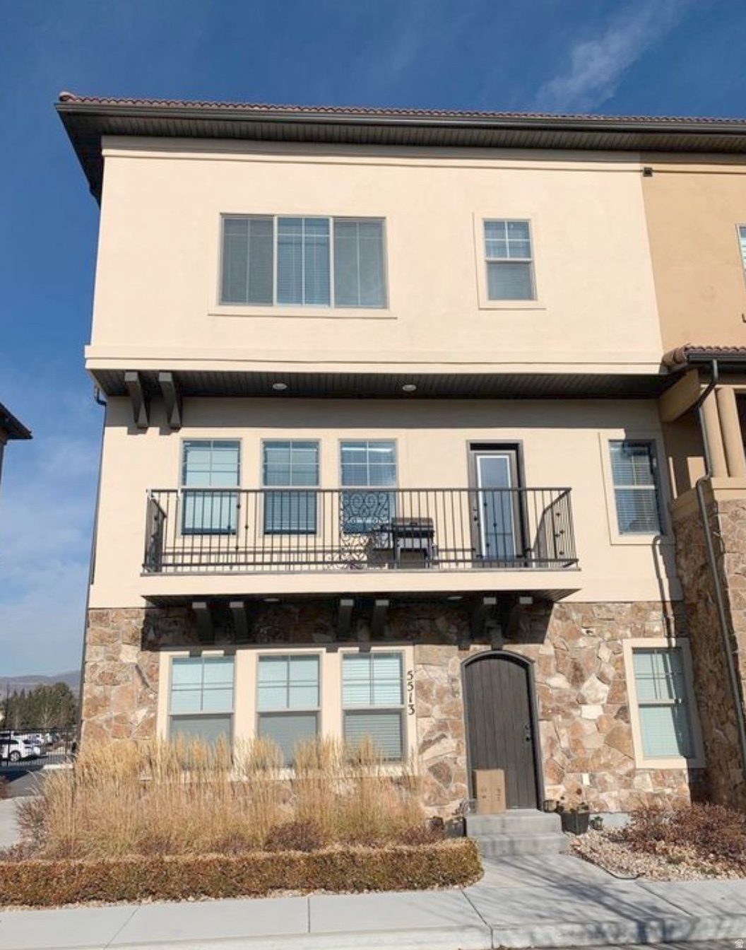 Stunning Townhome in Prime Highland location with Mountain Views! Take in breathtaking views of Lone Peak and the Wasatch Range right from your townhome. This property features a generous primary suite complete with a large closet, dual shower, and soaking tub-your own private retreat. The expansive great room is ideal for entertaining. Extra-large garage with storage, utility sink, and electric vehicle charger. Step out onto the balcony overlooking the community park. Neighborhood amenities including a pool, hot tub, gym, and more. Located in great educational district. Around the corner from Highland library, shopping, Highland Town center, splash pad, parks, and trails. Don't miss this incredible opportunity!