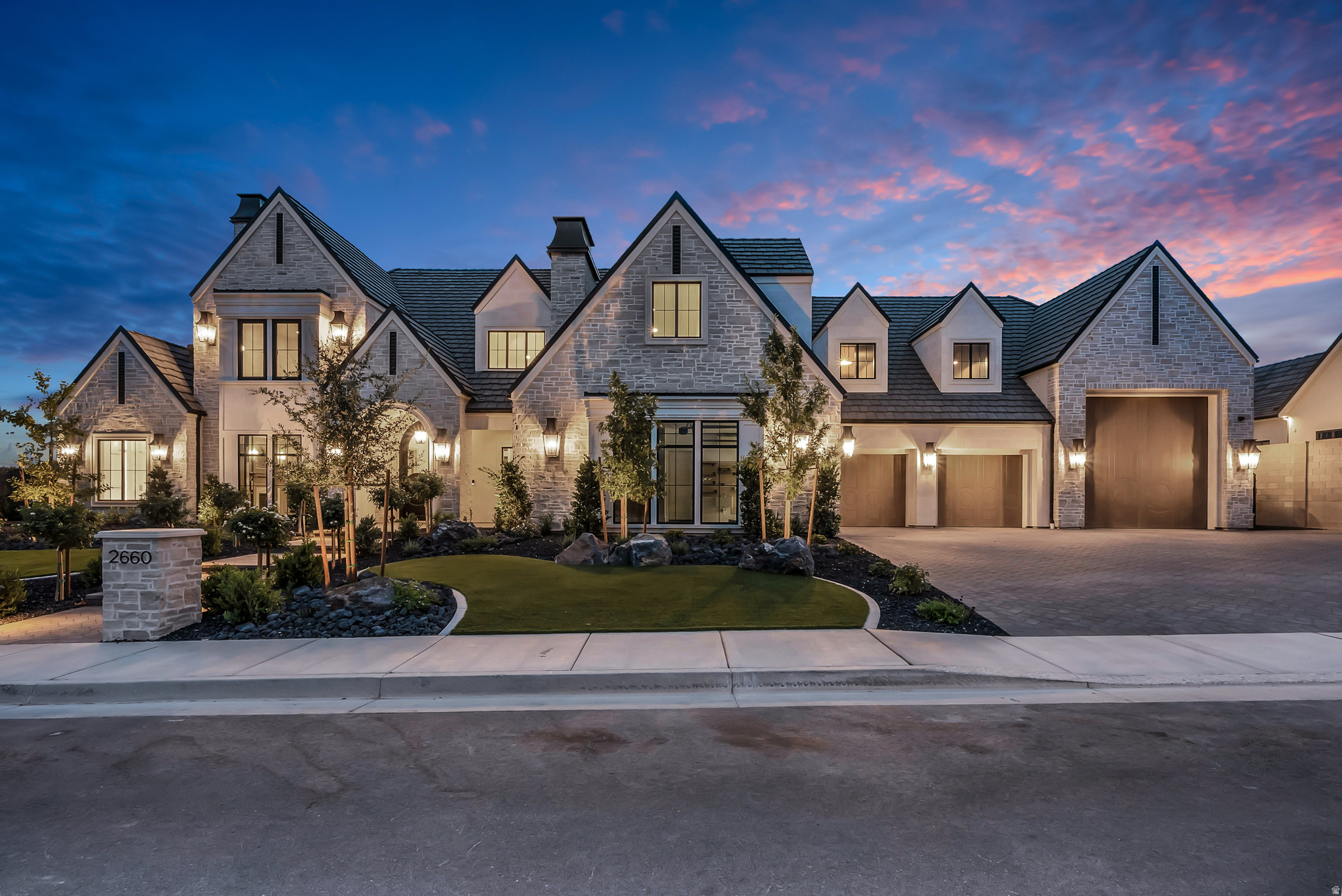 Tucked into one of the area's most sought-after communities, this custom Simister Homes haven offers nearly 7,800 square feet of thoughtfully designed living space - room to breathe, room to gather, and room to grow into. Six bedrooms and seven bathrooms provide space for everyone to have their own retreat, while a dedicated home office, private theater, and personal gym mean you rarely have to leave to work, unwind, or work out. Throughout the home, Crestron Home automation puts lighting, climate, entertainment, and more at your fingertips - effortless control woven seamlessly into everyday living. Step outside and the home opens into its own private resort. Mountain views frame a resort-style pool complete with fire features and cascading waterfalls, while a cozy fireplace and built-in grill make both quiet evenings and lively get-togethers effortless. When it's time to play, the property delivers: a putting green for sharpening your short game, a trampoline for the kids (or the young at heart), a basketball court for pickup games, and a pickleball court for friendly competition with neighbors.Practical luxury hasn't been overlooked either-a 3-car garage plus extra-deep RV parking gives you the flexibility to store toys, tools, and everything in between. Whether you're hosting a crowd or savoring a night in, this home was built to move effortlessly between the two. Come experience it for yourself.