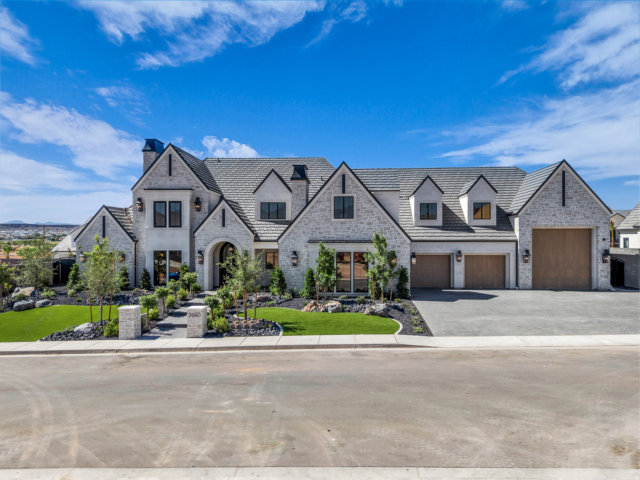 Tucked into one of the area's most sought-after communities, this custom Simister Homes haven offers nearly 7,800 square feet of thoughtfully designed living space - room to breathe, room to gather, and room to grow into. Six bedrooms and seven bathrooms provide space for everyone to have their own retreat, while a dedicated home office, private theater, and personal gym mean you rarely have to leave to work, unwind, or work out. Throughout the home, Crestron Home automation puts lighting, climate, entertainment, and more at your fingertips - effortless control woven seamlessly into everyday living. Step outside and the home opens into its own private resort. Mountain views frame a resort-style pool complete with fire features and cascading waterfalls, while a cozy fireplace and built-in grill make both quiet evenings and lively get-togethers effortless. When it's time to play, the property delivers: a putting green for sharpening your short game, a trampoline for the kids (or the young at heart), a basketball court for pickup games, and a pickleball court for friendly competition with neighbors.Practical luxury hasn't been overlooked either-a 3-car garage plus extra-deep RV parking gives you the flexibility to store toys, tools, and everything in between. Whether you're hosting a crowd or savoring a night in, this home was built to move effortlessly between the two. Come experience it for yourself.
