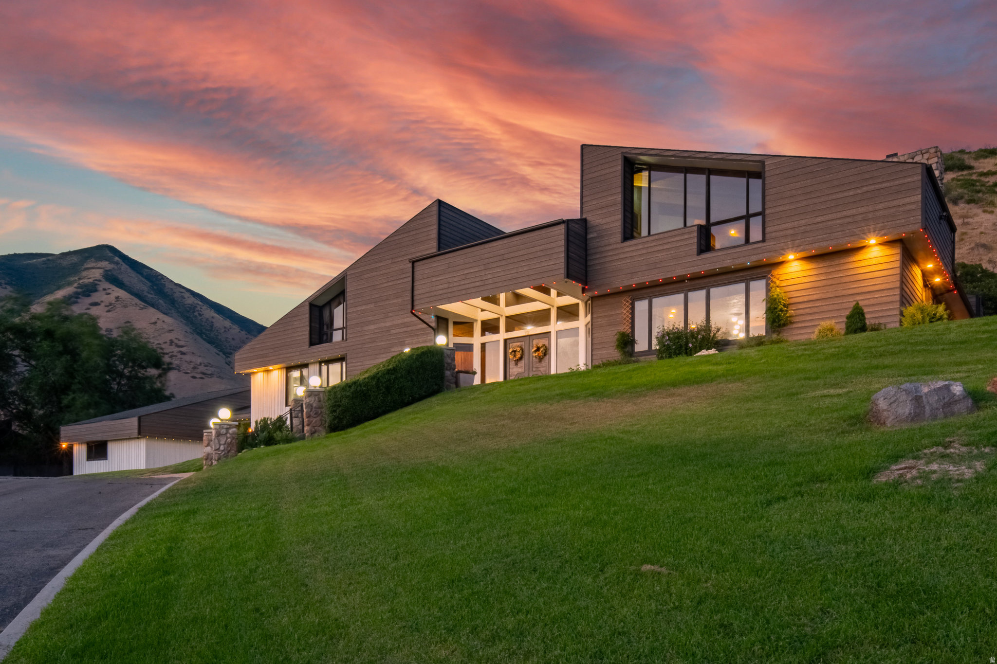 This extraordinary Mapleton Estate is back on the market - now is your chance to own one of the area's most unique and iconic properties. Nestled on 2.71 private acres with breathtaking valley and mountain views, this remarkable home offers over 9,000 square feet of character, luxury, and versatility. Once owned by legendary golf champion Billy Casper, the property carries a rare legacy while offering modern comfort and endless possibilities. Featuring a heated in-ground pool, mature landscaping, fruit trees, vaulted ceilings, expansive entertaining spaces, and a beautifully appointed accessory apartment, this home is truly unlike anything else on the market. Tucked away on a private lane in a gated setting, the property offers both privacy and convenience with stunning natural surroundings. Whether you are searching for a multi-generational estate, an entertainer's dream home, or a one-of-a-kind luxury retreat, 12 Quiet Meadow Lane delivers timeless charm and exceptional opportunity. Homes like this rarely become available twice!