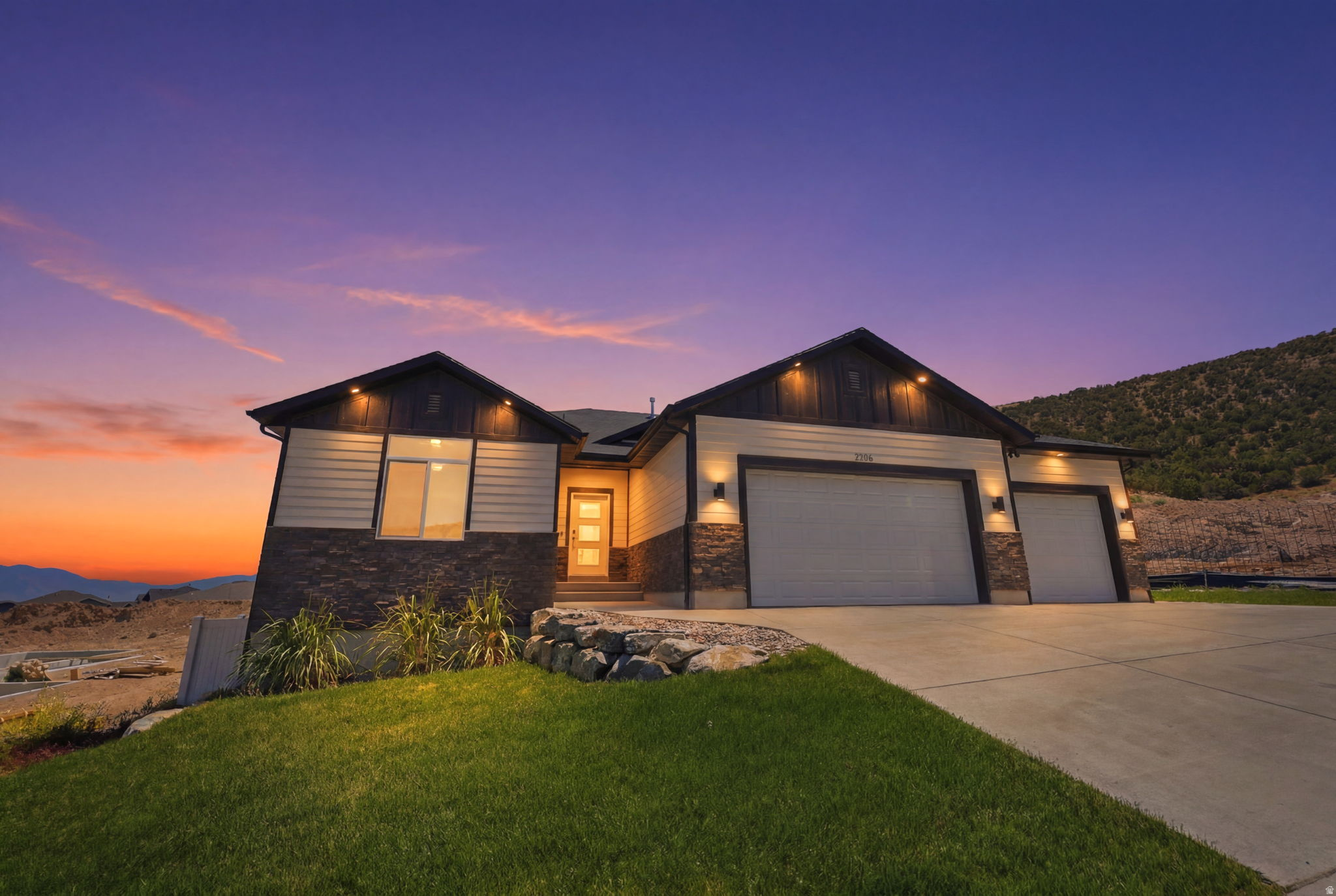 Experience elevated living in this stunning Eagle Mountain residence, where thoughtful design, premium finishes, and exceptional functionality come together seamlessly. Boasting 5 bedrooms, 3.5 bathrooms, and expansive open-concept living spaces, this home offers both elegance and comfort at every turn.  From the moment you enter, you'll appreciate the attention to detail and high-end finishes throughout. The spacious great room flows effortlessly into the gourmet kitchen and dining area, creating an ideal setting for both everyday living and entertaining.  The fully finished basement features a private mother-in-law apartment with a separate entrance, offering incredible flexibility for multigenerational living, long-term guests, or income-producing potential.  An oversized 3-car garage equipped with EV charging adds convenience and modern appeal, while providing ample space for vehicles, storage, and recreational gear.  Step outside to your own private backyard retreat. Backing to open space with no rear neighbors, this beautifully maintained outdoor oasis offers a rare sense of privacy. Enjoy summer evenings gathered around the custom grilling area, entertain guests with ease, or simply relax and take in the peaceful surroundings.  Thoughtful upgrades to the home's HVAC system include a humidifier and additional filter system that provides efficiency while reducing noise.   Combining luxury, versatility, and exceptional outdoor living, this remarkable property delivers a lifestyle that's difficult to find and impossible to forget.   Square footage figures are provided as a courtesy estimate only and were obtained from county records. Buyer is advised to obtain an independent measurement.