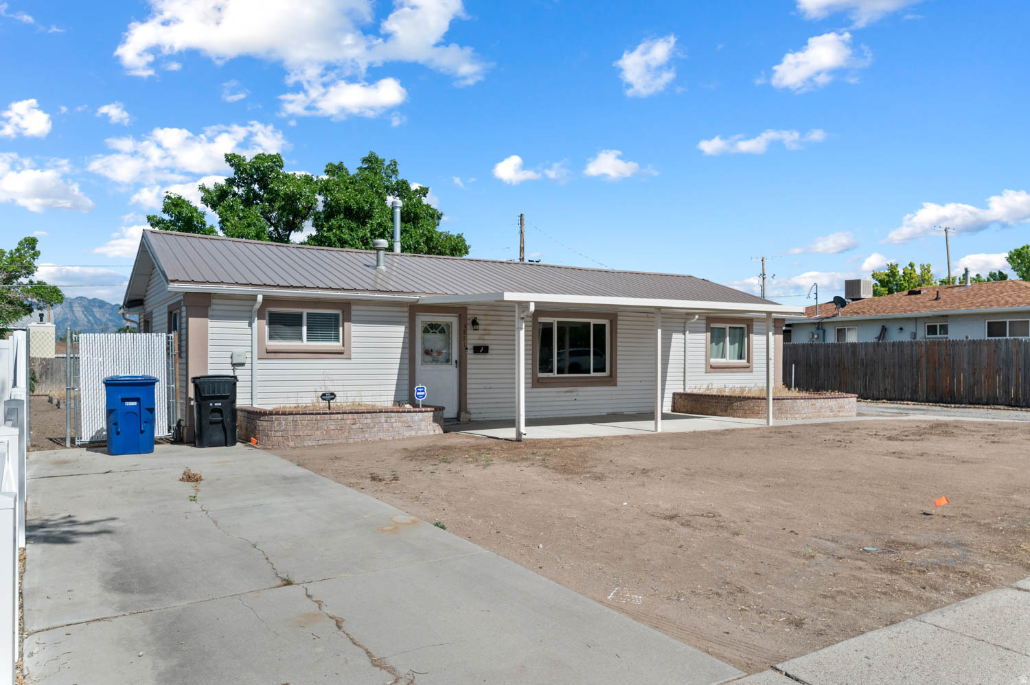 Welcome to this beautifully updated home! Enjoy gorgeous mountain views right from your property, along with quick, easy access across the entire valley. Every major system has been updated! Features include a brand-new metal roof installed in 2025, plus a high-efficiency HVAC system and water heater both new from 2023. Step inside to find a completely remodeled, luxurious full bathroom designed with contemporary finishes. The property is fully equipped with lightning-fast fiber internet. Outside, the spacious yard features a large utility shed with incredible potential to easily convert into a detached garage. With all the costly upgrades already complete, this worry-free home is ready for you to move straight in and enjoy!