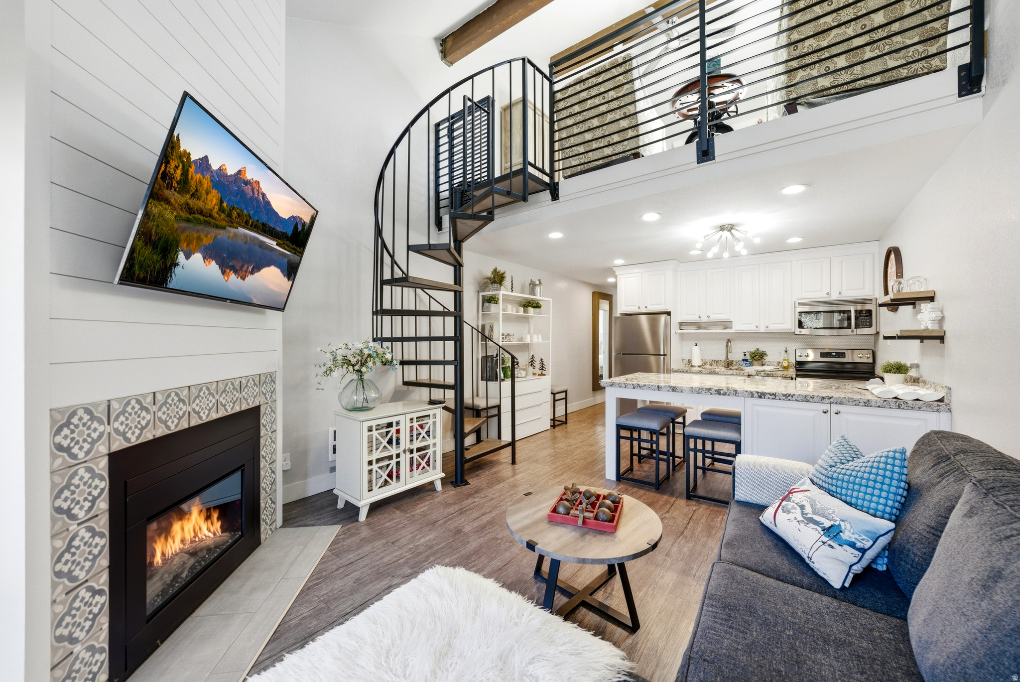 Opportunities like this are rare.  Perched on the top floor as a coveted end unit, this fully remodeled 2-bedroom residence stands out for its views, design, location, and proven rental history. Consistent bookings, strong annual revenue, and excellent guest reviews make it one of the top-performing units in the building, offering immediate income potential.  Inside, a clean, modern mountain aesthetic defines the space. Vaulted ceilings and lofted architecture create an open, airy feel, while additional windows bring in abundant natural light and showcase surrounding views. New upgraded windows with sound-dampening features enhance comfort and privacy, creating a quiet retreat after a day on the mountain.  The location is equally compelling, just steps from Park City Mountain, golf, and Old Town. Positioned on the free bus route, it allows for easy, car-free access to year-round recreation, dining, and shopping.  Recent exterior improvements add long-term value and peace of mind. A new roof was completed in 2025, and the building is undergoing re-cladding with modern, high-performance materials, all paid in full. These upgrades enhance both the aesthetic and durability while helping minimize future maintenance.  Functionality matches the design, with exceptional storage rarely found in comparable units, including multiple owner closets that allow for secure personal use while maintaining rental flexibility. A full-size washer and vented dryer add everyday convenience.  Whether you're seeking a refined mountain escape, a walkable lifestyle near skiing and golf, or a high-performing investment, this residence delivers.