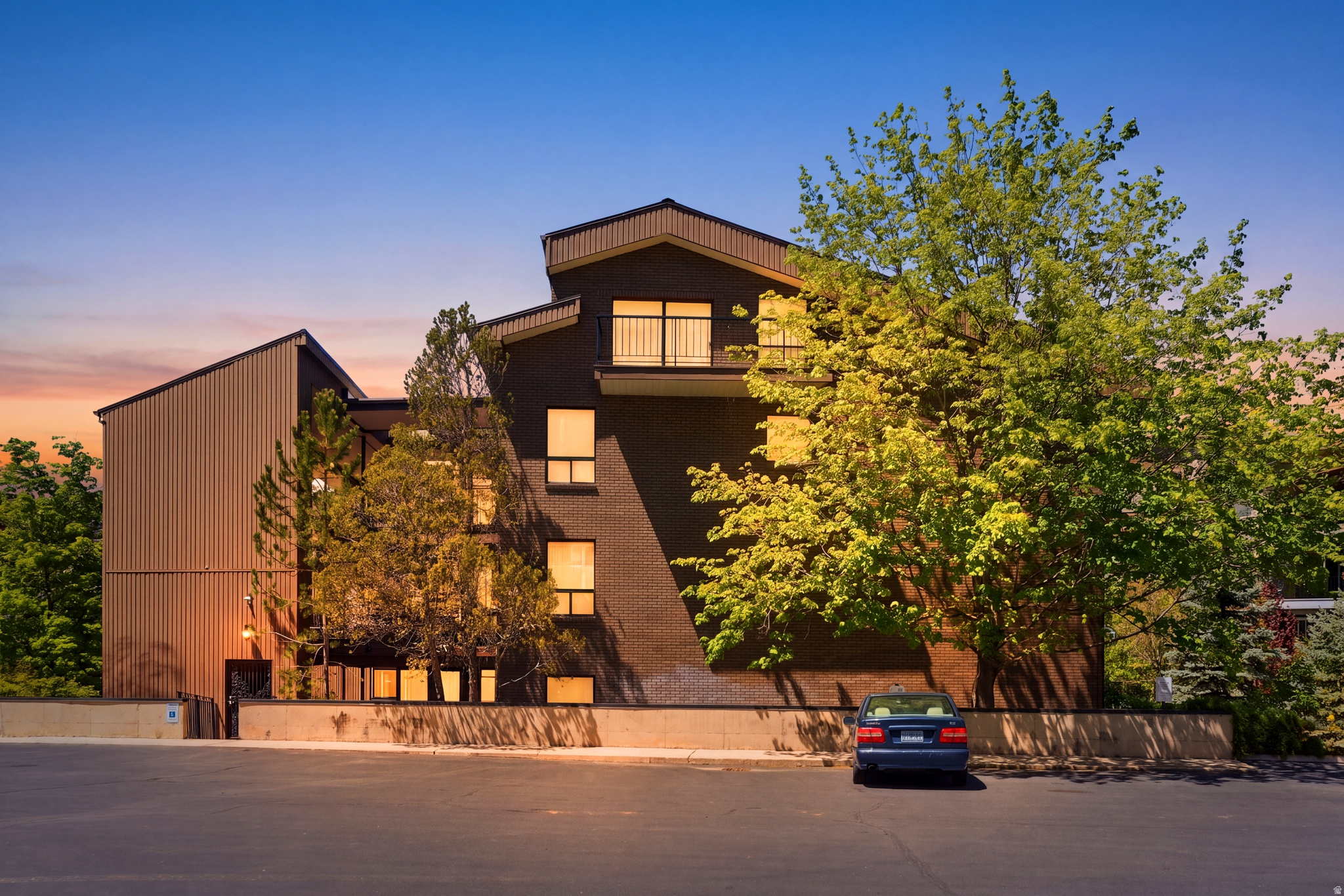 **Furniture can be included with right offer** Beautifully appointed main-level condo in the highly sought-after Oakwood Gardens at Donner Way-where location and lifestyle come together effortlessly. Ideally situated on Salt Lake's east bench at the mouth of Emigration Canyon, this residence offers immediate access to hiking and biking trails, along with stunning views of the mountains, the University of Utah, and downtown Salt Lake City. This quiet, ground-level unit provides true single-level living with no stairs,(elevator as well) offering both comfort and convenience. Ideally located just steps from the secured entrance and parking, the home also features a spacious private patio that opens directly to lush, park-like common areas with mature trees and beautifully maintained landscaping. Perfectly positioned for those connected to the University of Utah, nearby medical campuses, and downtown business centers, this home is an excellent option for professionals, including doctors, faculty, and relocation buyers seeking low-maintenance living in a premier east bench location.