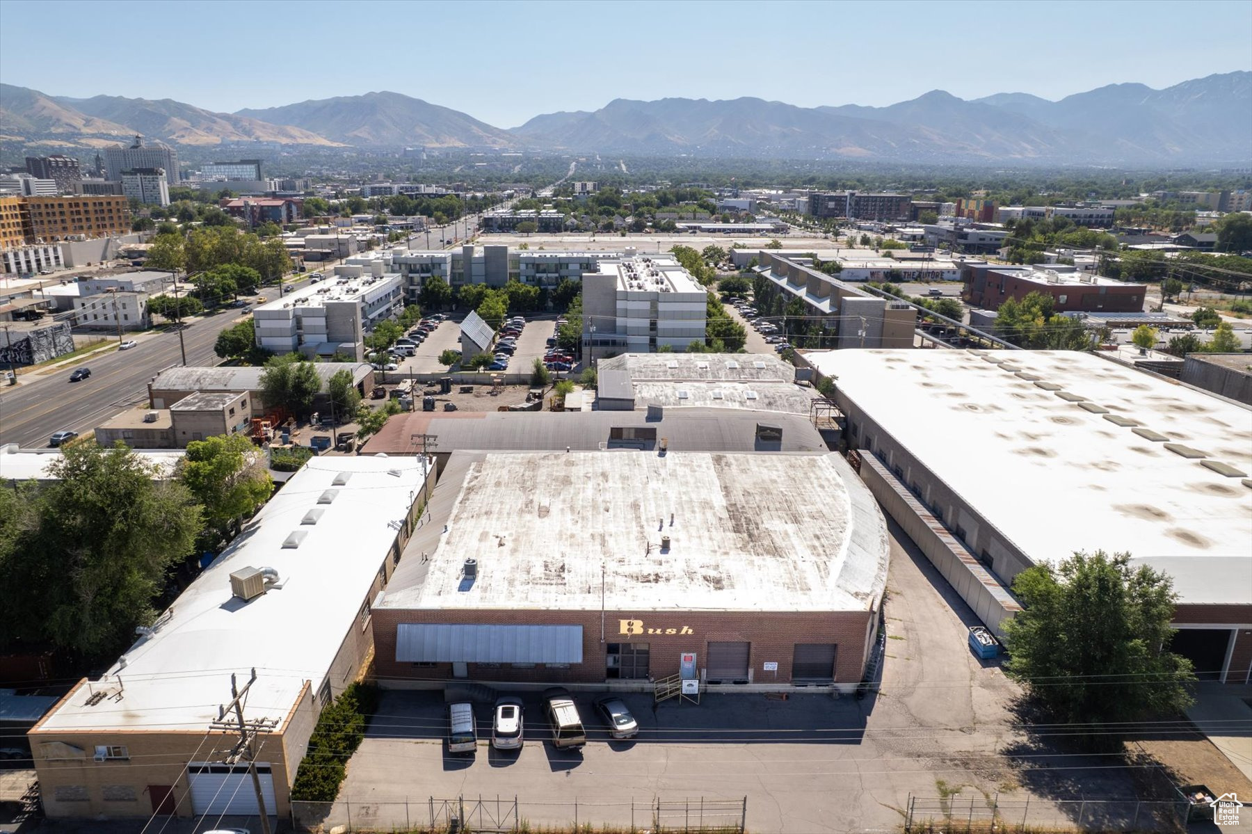 This 1.88-acre (that includes two parcels, tax ID#s 15-12-176-002 and 15-12-176-001) L-shaped development site with frontage on both 800 South and 500 West is positioned in the heart of Salt Lake City's dynamic and rapidly transforming Granary District. Surrounded by a growing mix of residential, creative, and commercial uses, the site offers a rare opportunity for impactful infill development in one of the city's most active redevelopment corridors.  Zoned MU-11, key characteristics include: High-density urban development Mixed residential and commercial uses Mid-rise to high-rise buildings Walkable, transit-oriented design Ground-floor retail and active street frontage encouraged Designed for redevelopment corridors and urban centers, this site is set to benefit from significant public investment in multimodal infrastructure: upgraded sidewalks, protected bike lanes, improved intersections, and enhanced TRAX light rail access, including proximity to the 900 South station and potential new stops in the district. These improvements are designed to encourage walkability, reduce vehicle reliance, and support Salt Lake City's smart growth and sustainability goals.  With strong market fundamentals, ongoing redevelopment momentum, including major nearby projects, and Salt Lake City's pro-growth climate, this site represents a compelling opportunity for developers or users seeking scale, flexibility, and visibility in a premier downtown location.  Square footage figures are provided as a courtesy estimate only and were obtained from Salt Lake County Records.  Buyer is advised to obtain an independent measurement. Buildings can be leased separately.