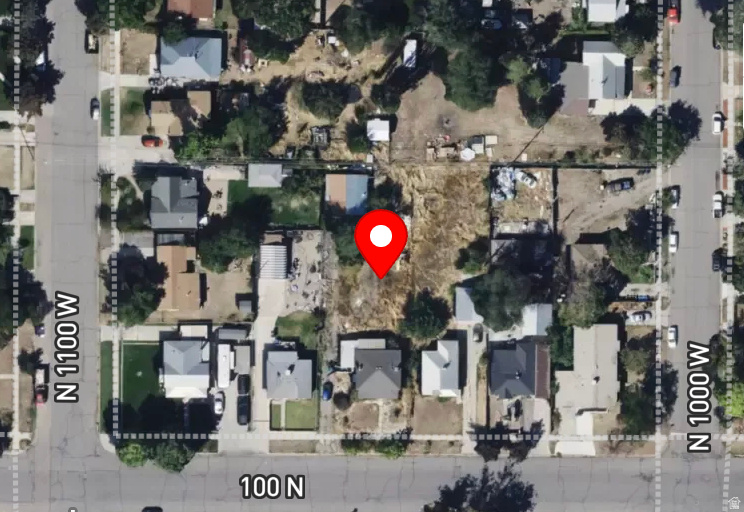 This is a flag lot behind the home at 1050 W 100 N Provo, UT 84601.  The Tax ID # listed, and the est taxes, refer to the home in the front. A new tax ID number for the flag lot will be issued in a couple weeks. Utility bond is required as part of the sale, to be completed at the time of closing.