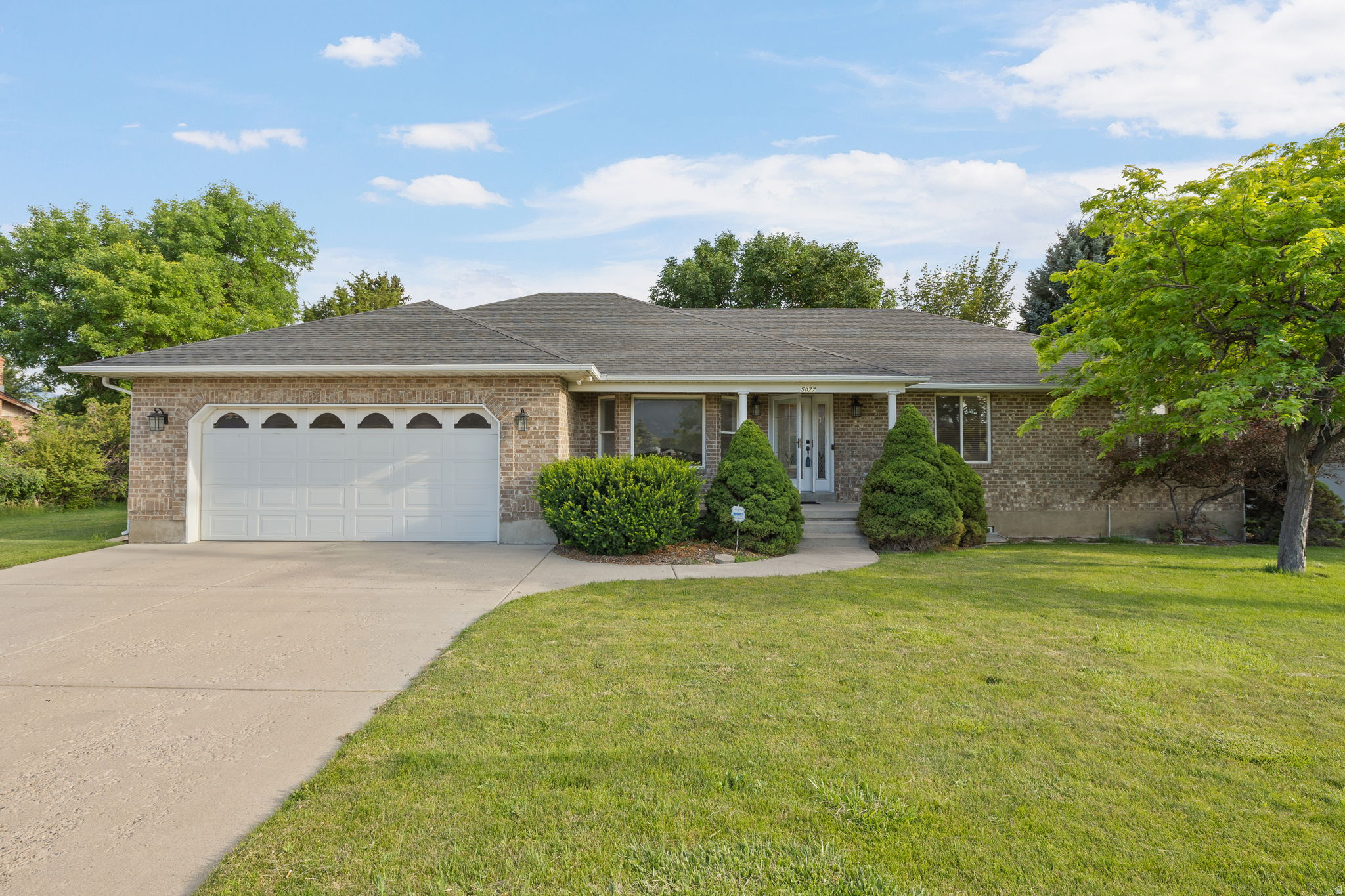 **Grand Opening this Saturday, July 18th from 10am-1pm!** Let's address the obvious first: yes, the home is on a busy road. That is also why you can buy a 6-bedroom, 4-bath home with just over 4,000 finished square feet, a fully finished basement, one-third of an acre, and a backyard overlooking Alpine Country Club starting at $699,900! Inside, the traffic noise fades away and the home feels surprisingly quiet. The main level has vaulted ceilings, large windows, an open kitchen and great room, main-floor laundry, and a spacious primary suite with dual sinks, a jetted tub, and a separate glass-enclosed shower. The kitchen includes dark cabinetry, upgraded countertops, stainless steel appliances, and a dual-fuel convection range with a gas cooktop and electric oven.  The finished basement adds a massive second living room, additional bedrooms, cold storage, and a theater or gaming room. It is plumbed for a future second kitchen and laundry, giving the next owner a strong head start toward a potential basement ADU, multigenerational living space, guest suite, or more independent lower-level setup. Buyer to verify ADU requirements, approvals, and permitted use with Highland City. Out back, there are no rear neighbors, just mature landscaping, fruit trees, mountain views, and the golf course. The covered patio has stone flooring and plenty of room for summer dinners, quiet evenings, or entertaining. The oversized garage includes a workbench and hot and cold water for washing cars, bikes, or pets, while the powered shed adds even more usable workspace and storage. There is room to expand the side parking, American Fork Canyon is less than two miles away, and freeway access, shopping, dining, Thanksgiving Point, and Traverse Mountain are all within an easy drive. Homes with this much space, flexibility, and backyard privacy rarely come available in Highland at this price. Square footage is provided as a courtesy from an appraisal. Buyer and buyer's agent to verify all information.