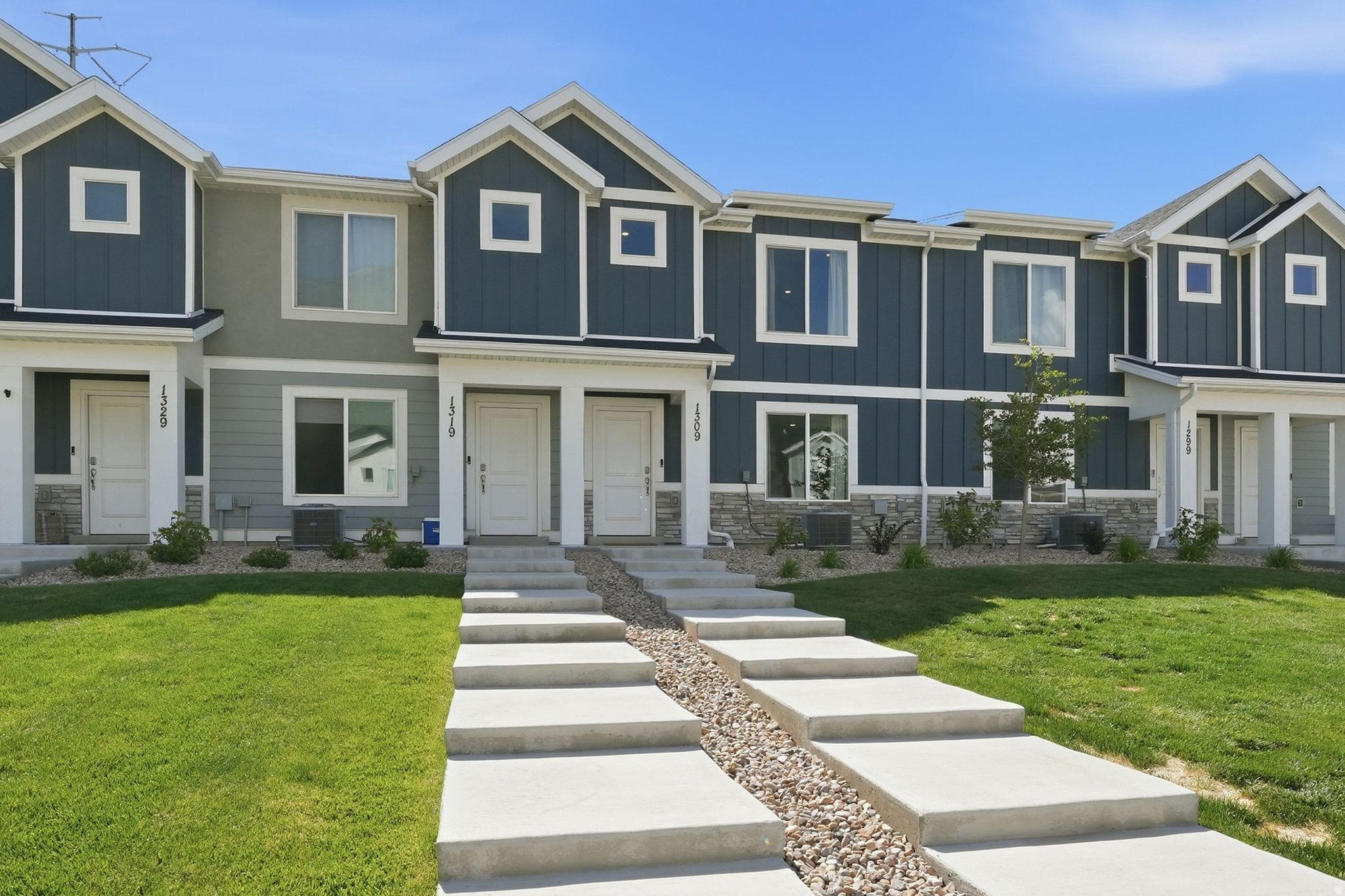 Beautiful townhome with beautiful mountain views! This home features 3 bedrooms, 2 bathroom and a 2-car garage - Open concept living on the main floor. Quartz kitchen and bathroom countertops, updated hardware on cabinets and a Spacious- 6 foot ceilings crawl space for storage.  Community pool, pump track, pickleball, parks and MORE. Come be apart of this great community!