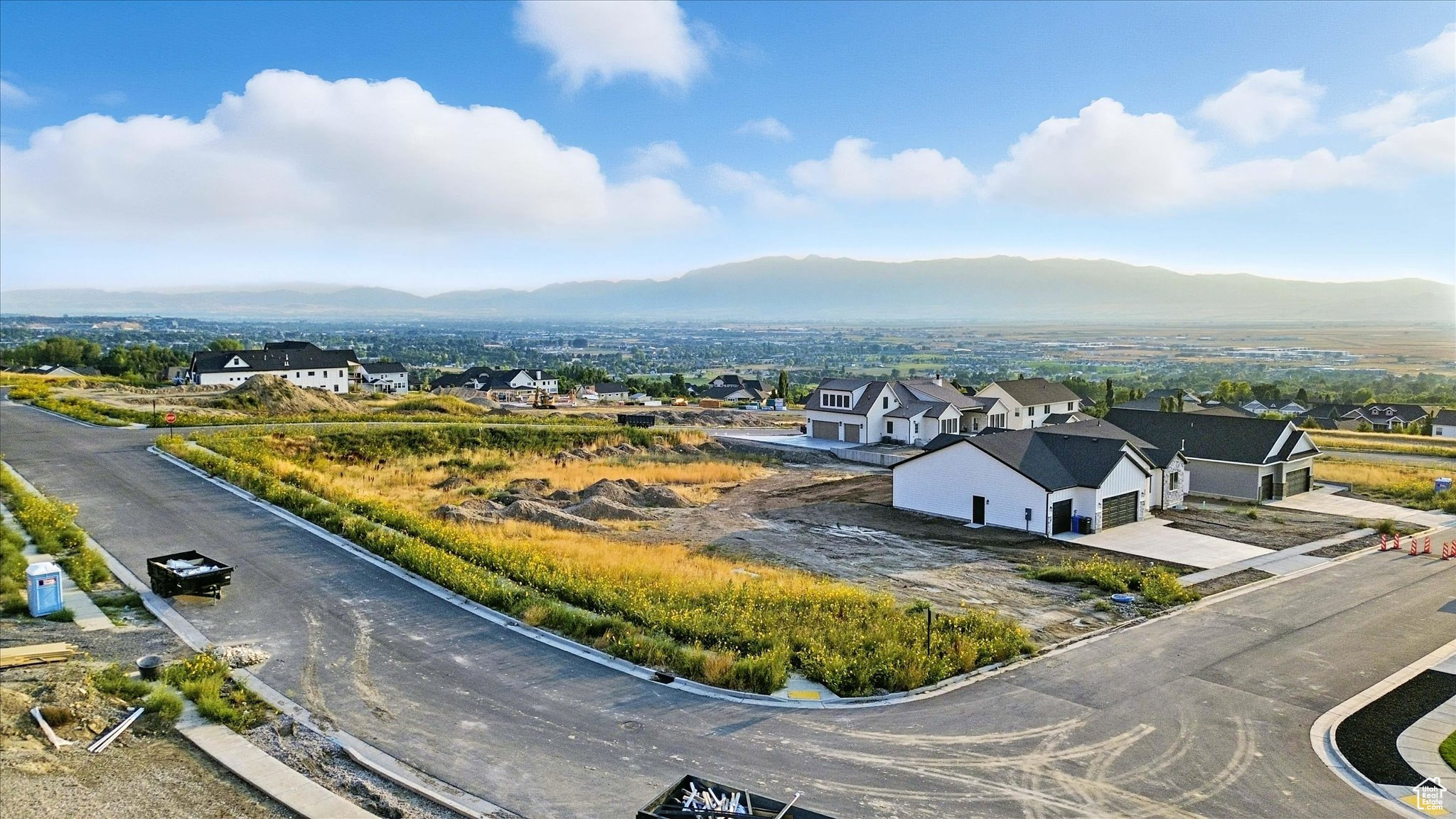 This .29-acre East Bench lot #17 offers some of the valley's most breathtaking views and the perfect setting for your dream home. With an ideal size for flexible design, the property allows for the potential of a walkout basement and minimal excavation, streamlining your build process.  Seize the opportunity to create a custom retreat in Hyde Park's most desirable new community-welcome home to Cedar Bluffs.