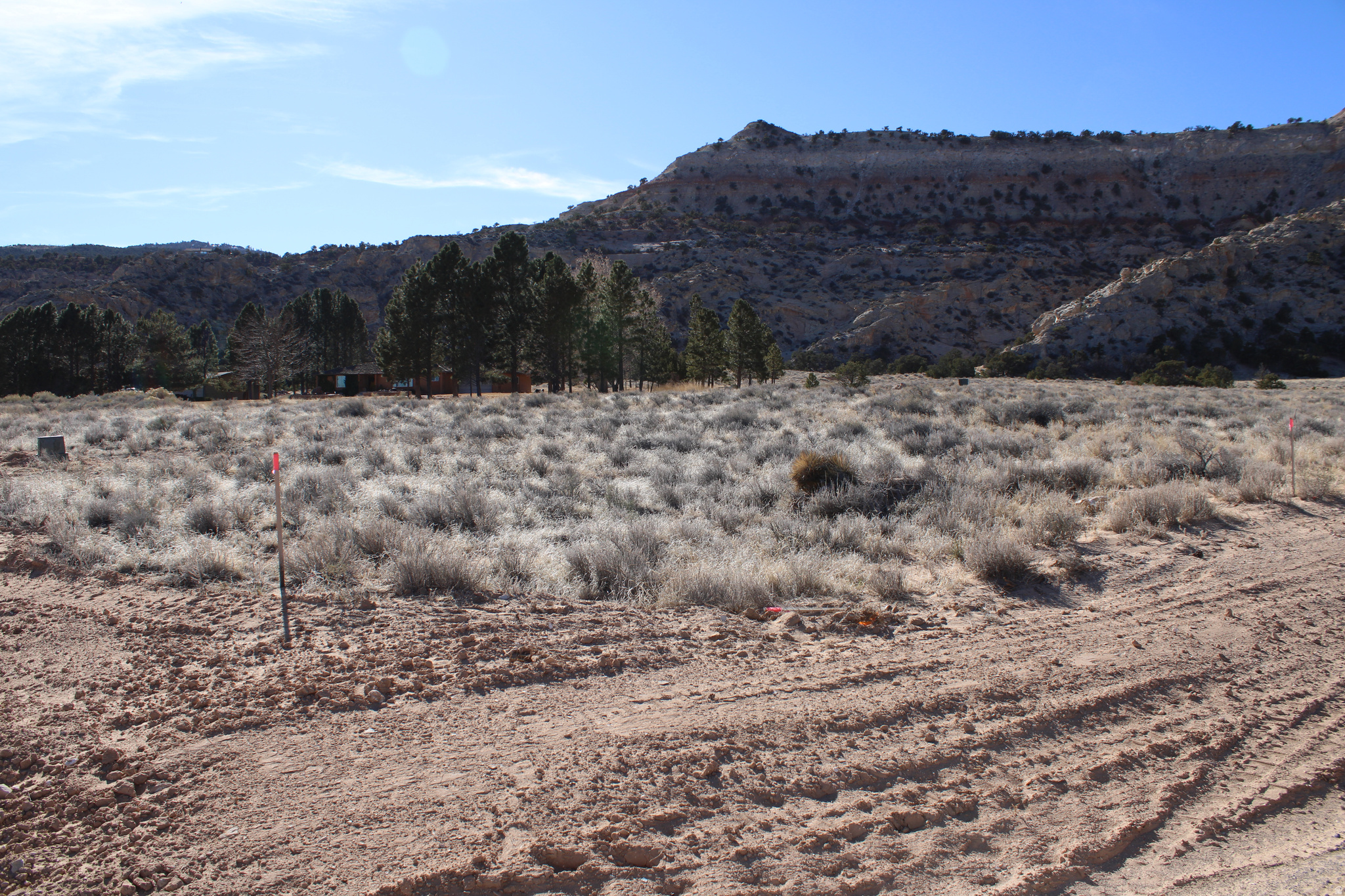 Discover your own slice of serenity in Teasdale, UT! This 1.5-acre parcel is surrounded by jaw-dropping white and red rock mountains, offering breathtaking views in every direction. The peaceful, serene setting makes this the perfect escape from city life and summer heat. Just 12 miles from Capitol Reef National Park and close to Boulder Mountain and other iconic destinations, this location is ideal for outdoor lovers and adventure seekers alike. From hiking to stargazing, the possibilities are endless. This is a property you truly have to see in person to believe and experience the magic for yourself.