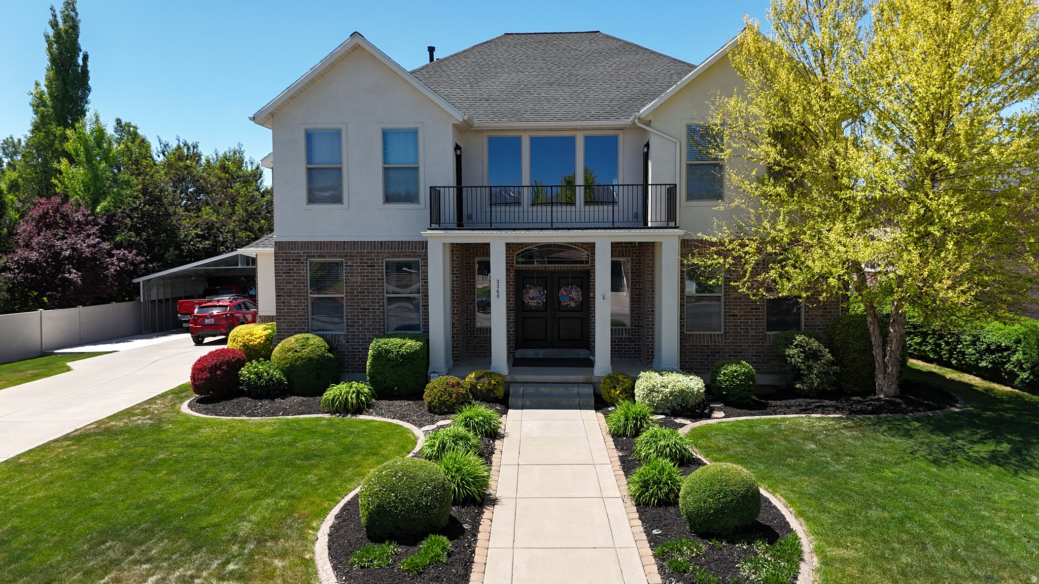 Stunning brick executive home that checks every box! From the soaring grand foyer to the rich solid walnut floors, quality and craftsmanship are evident throughout. With seven oversized bedrooms, FIVE gas fireplaces, a gorgeous home office, and formal dining, this home is built for both elegant entertaining and comfortable everyday living. The resort-style backyard features a full pickle ball court and basketball standard, while two decks - including one off the primary suite - offer the perfect spots to relax. Wake up to breathtaking east-facing mountain views every morning. Fresh carpet, new paint, a 3-year-old roof, and immaculate condition make this one truly move-in ready. Add in a 3-car carport, shed, and stunning professional landscaping and you have an unmatched offering. Homes like this don't come along often - schedule your showing today!